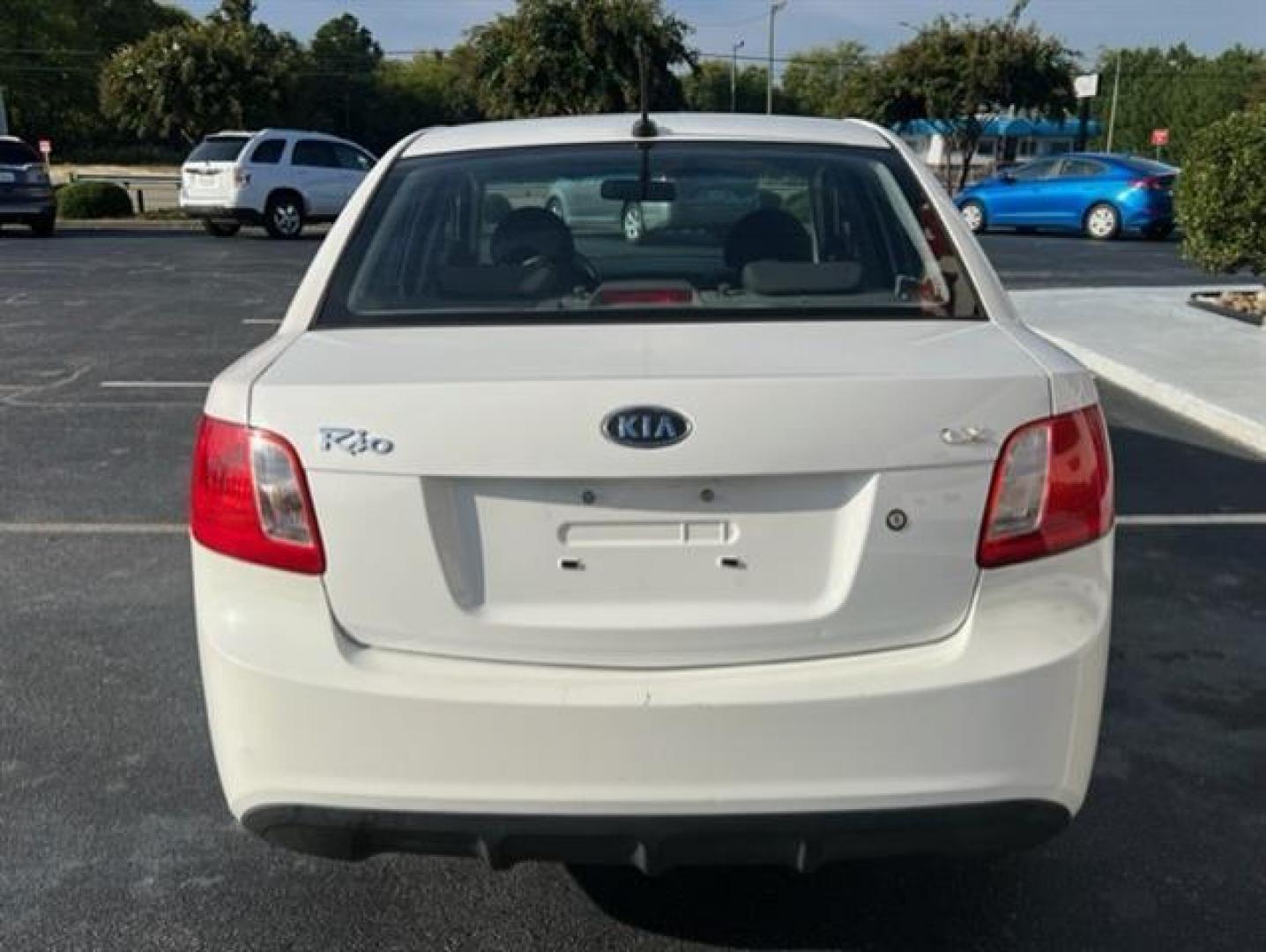 2010 White Kia Rio LX (KNADH4A31A6) , located at 3900 Bragg Blvd., Fayetteville, NC, 28303, (910) 868-3000, 35.081905, -78.943367 - T-8208-R3 - 2010 Kia Rio LX KNADH4A31A6601455 - Photo#2