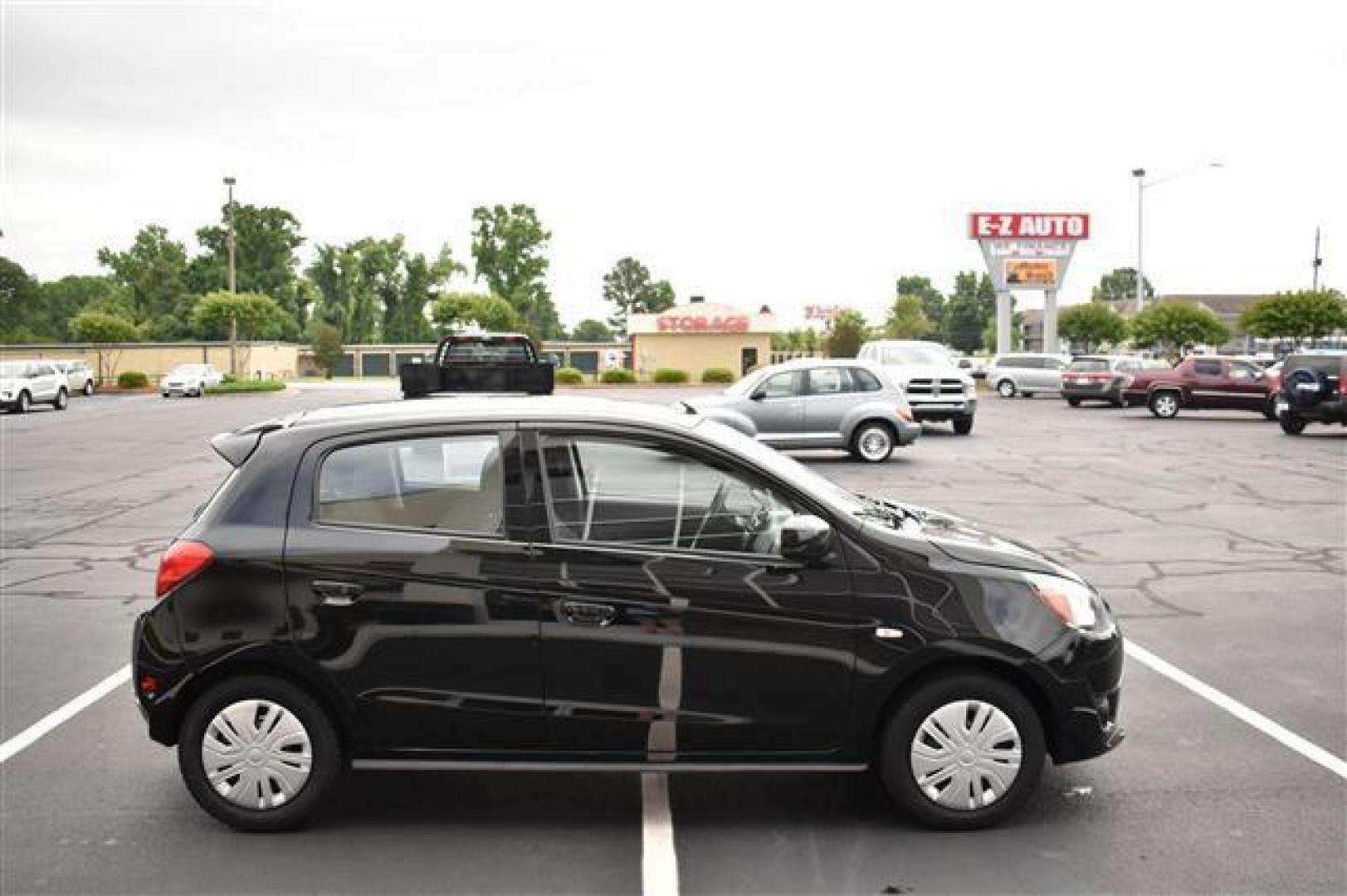 2014 Black Mitsubishi Mirage (ML32A3HJ2EH) , Manual transmission, located at 3900 Bragg Blvd., Fayetteville, NC, 28303, (910) 868-3000, 35.081905, -78.943367 - Photo#1