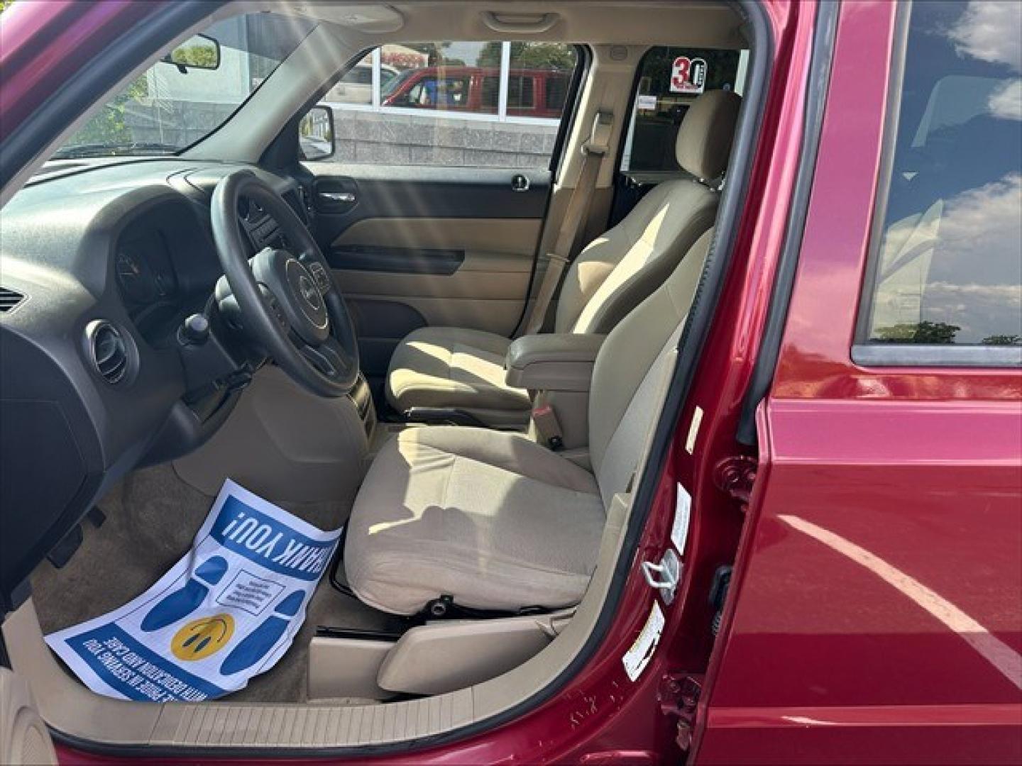2014 Deep Cherry Red Crystal PC Jeep Patriot Sport 2WD (1C4NJPBB2ED) , Continuously Variable Transmission transmission, located at 3900 Bragg Blvd., Fayetteville, NC, 28303, (910) 868-3000, 35.081905, -78.943367 - T-9297-R1 - 2014 Jeep Patriot 1C4NJPBB2ED617944- Photo#5