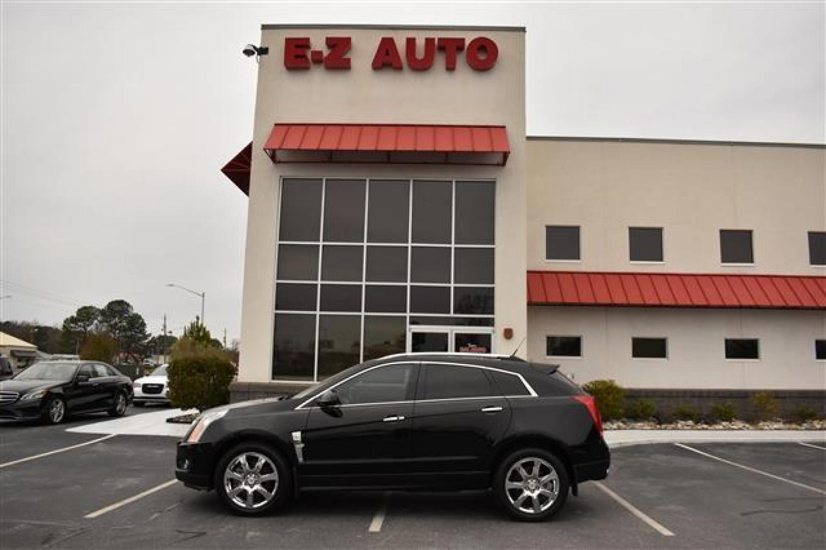 2012 Black Raven Cadillac SRX Performance (3GYFNBE31CS) , 6-Speed Automatic transmission, located at 3900 Bragg Blvd., Fayetteville, NC, 28303, (910) 868-3000, 35.081905, -78.943367 - T-9302-R - 2012 Cadillac SRX 3GYFNBE31CS588105 - Photo#0