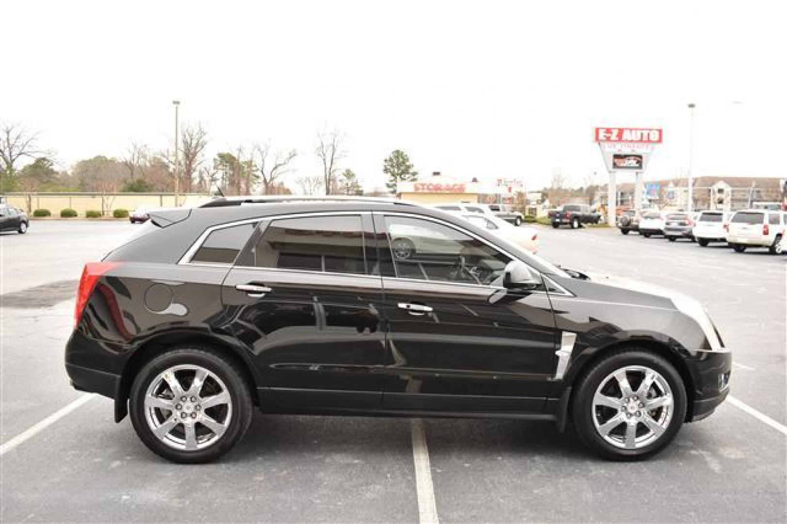 2012 Black Raven Cadillac SRX Performance (3GYFNBE31CS) , 6-Speed Automatic transmission, located at 3900 Bragg Blvd., Fayetteville, NC, 28303, (910) 868-3000, 35.081905, -78.943367 - T-9302-R - 2012 Cadillac SRX 3GYFNBE31CS588105 - Photo#1