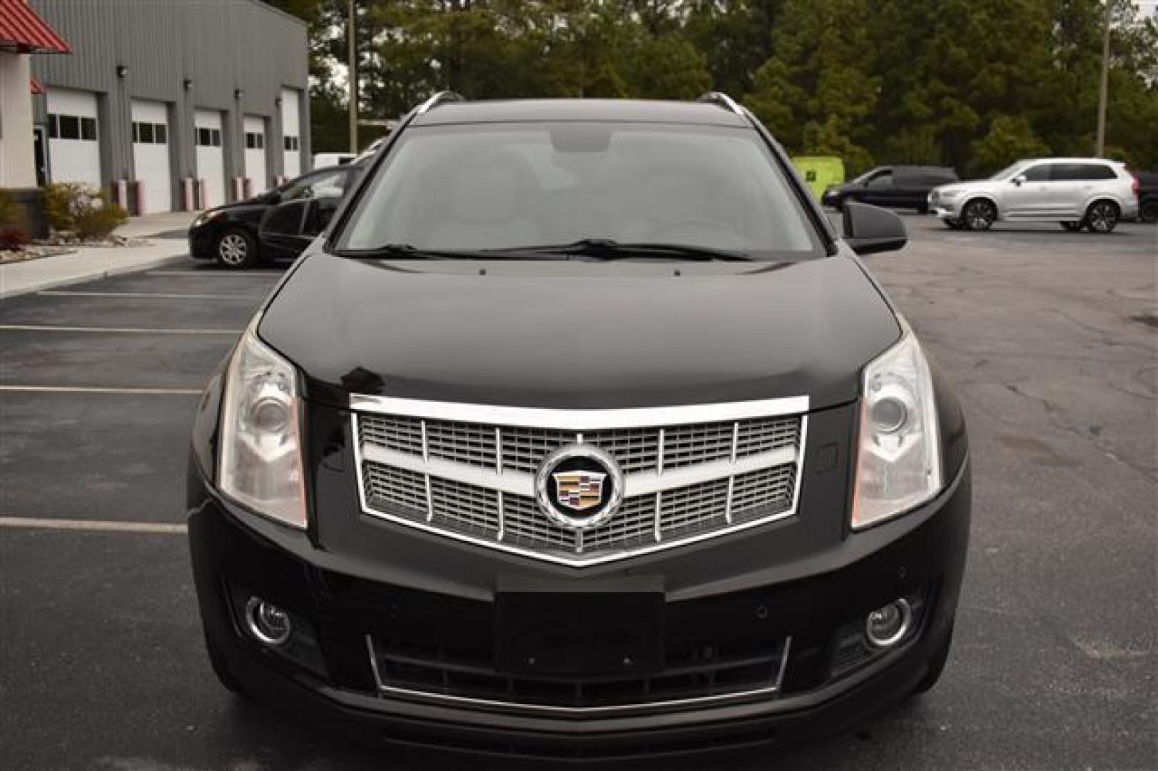 2012 Black Raven Cadillac SRX Performance (3GYFNBE31CS) , 6-Speed Automatic transmission, located at 3900 Bragg Blvd., Fayetteville, NC, 28303, (910) 868-3000, 35.081905, -78.943367 - T-9302-R - 2012 Cadillac SRX 3GYFNBE31CS588105 - Photo#2