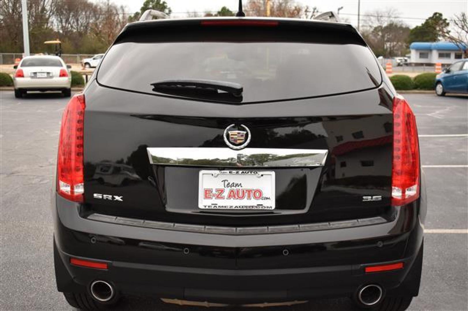 2012 Black Raven Cadillac SRX Performance (3GYFNBE31CS) , 6-Speed Automatic transmission, located at 3900 Bragg Blvd., Fayetteville, NC, 28303, (910) 868-3000, 35.081905, -78.943367 - T-9302-R - 2012 Cadillac SRX 3GYFNBE31CS588105 - Photo#3