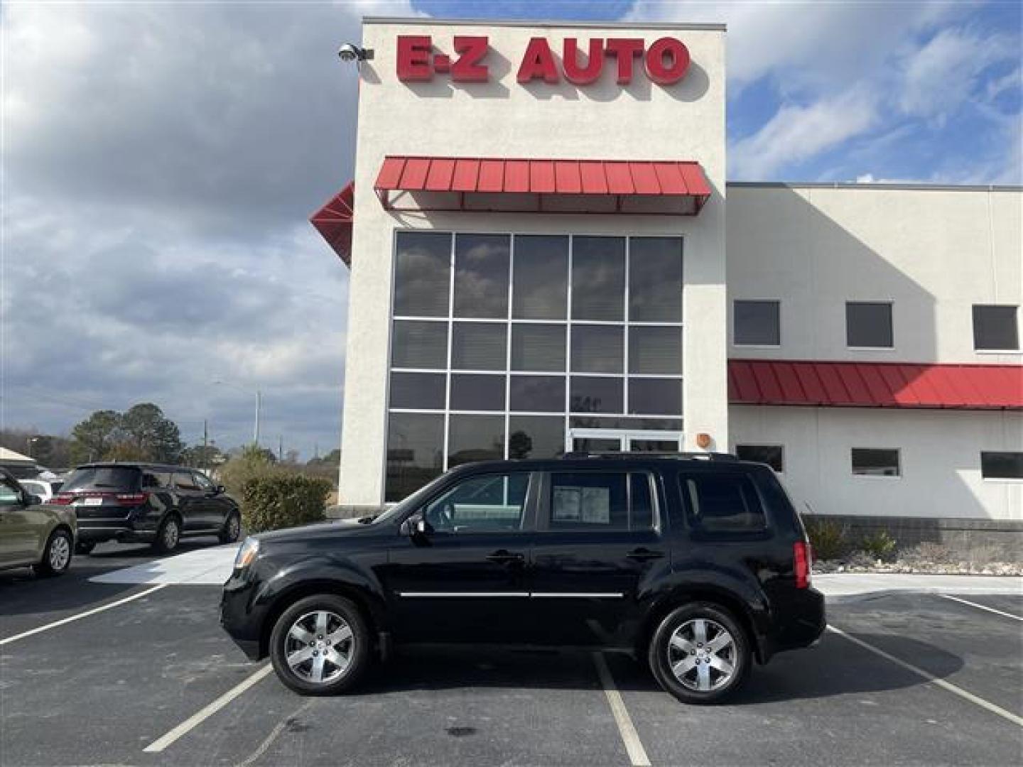 2015 Crystal Black Pearl Honda Pilot Touring 4WD 5-Spd AT with DVD (5FNYF4H9XFB) , 5-Speed Automatic transmission, located at 3900 Bragg Blvd., Fayetteville, NC, 28303, (910) 868-3000, 35.081905, -78.943367 - T-9323 - 2015 Honda Pilot 5FNYF4H9XFB009567 - Photo#0