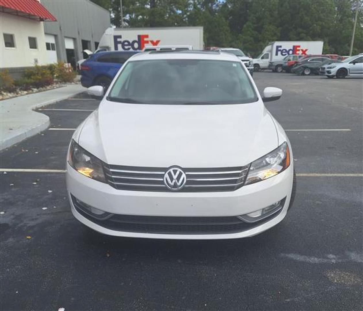 2013 Candy White Volkswagen Passat 2.0L TDI SEL Premium (1VWCN7A31DC) , 6-Speed Automatic transmission, located at 3900 Bragg Blvd., Fayetteville, NC, 28303, (910) 868-3000, 35.081905, -78.943367 - Photo#1