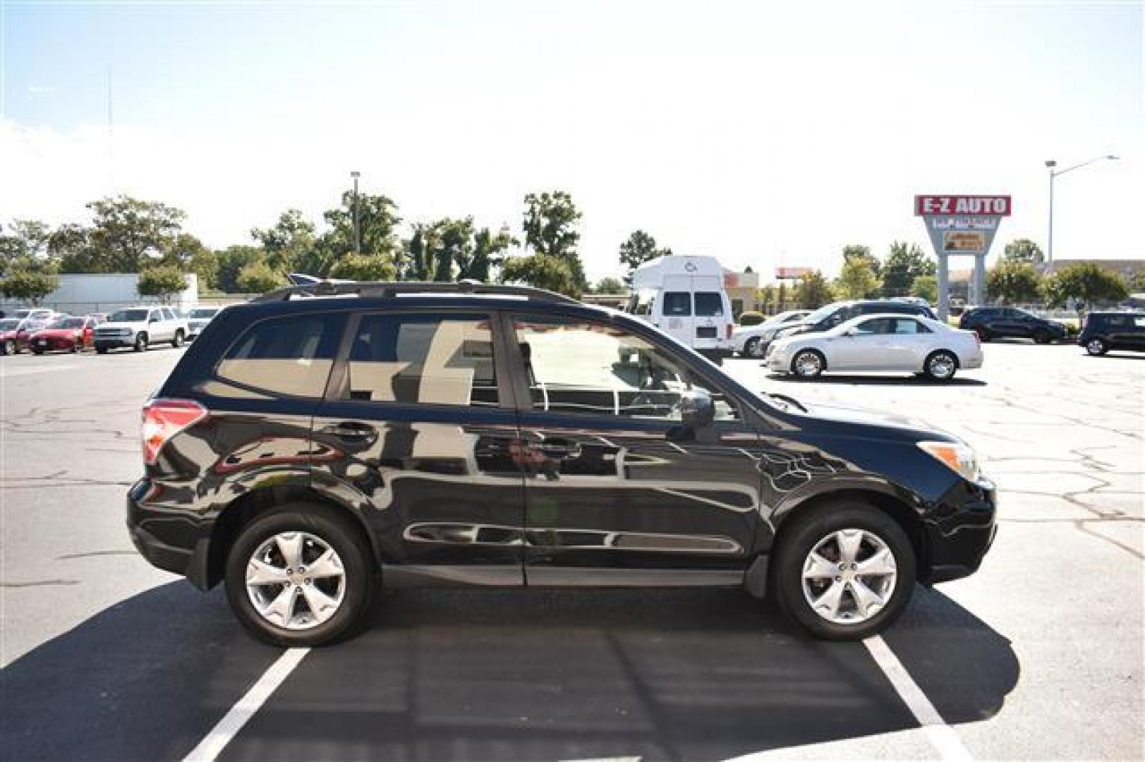 2014 Crystal Black Silica /Black Subaru Forester 2.5i Premium (JF2SJAEC9EH) , Continuously Variable Transmission transmission, located at 3900 Bragg Blvd., Fayetteville, NC, 28303, (910) 868-3000, 35.081905, -78.943367 - T-9405-R - 2014 Subaru Forester JF2SJAEC9EH433180 - Photo#1