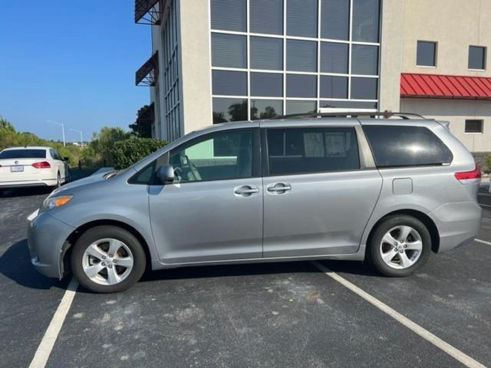 2014 Silver Toyota Sienna LE FWD 8-Passenger V6 (5TDKK3DCXES) , 5-Speed Automatic transmission, located at 3900 Bragg Blvd., Fayetteville, NC, 28303, (910) 868-3000, 35.081905, -78.943367 - T-9412 - 2014 Toyota Sienna 5TDKK3DCXES446248 - Photo #1