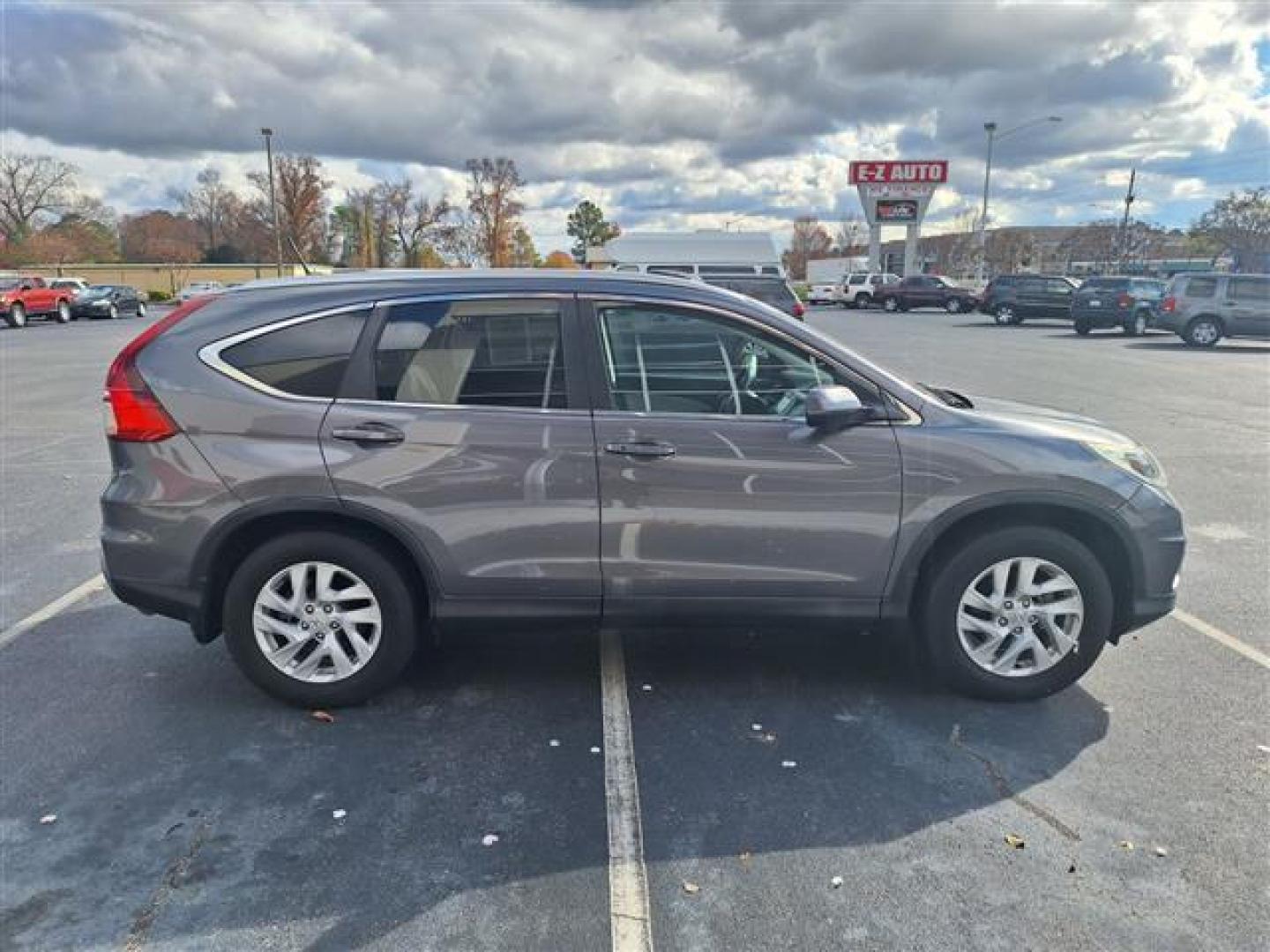 2015 Gray Honda CR-V EX-L 2WD (2HKRM3H71FH) , Continuously Variable Transmission transmission, located at 3900 Bragg Blvd., Fayetteville, NC, 28303, (910) 868-3000, 35.081905, -78.943367 - T-9434 - 2015 Honda CR-V 2HKRM3H71FH519925 - Photo#2