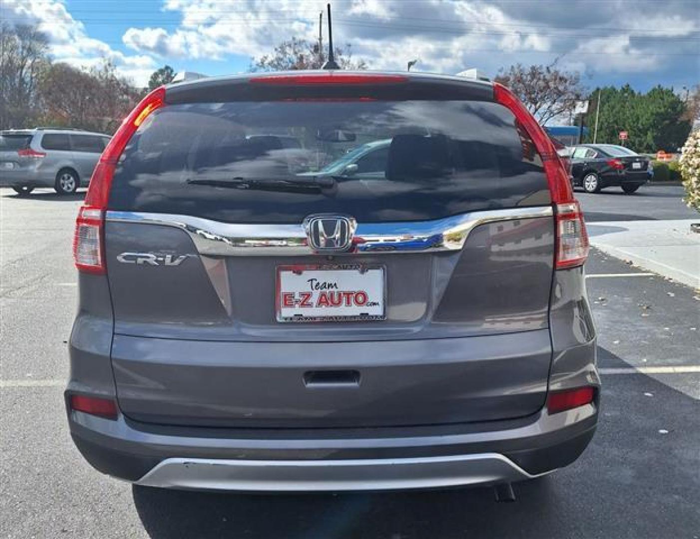 2015 Gray Honda CR-V EX-L 2WD (2HKRM3H71FH) , Continuously Variable Transmission transmission, located at 3900 Bragg Blvd., Fayetteville, NC, 28303, (910) 868-3000, 35.081905, -78.943367 - T-9434 - 2015 Honda CR-V 2HKRM3H71FH519925 - Photo#3