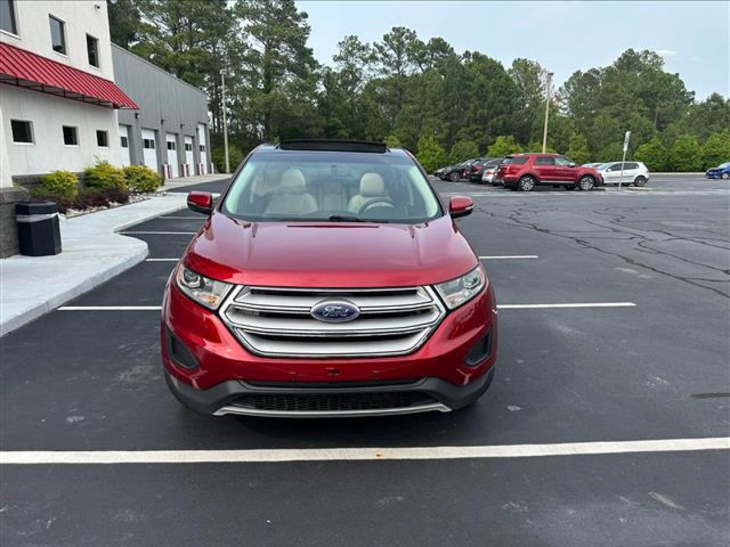 2017 Ruby Red Metallic Tinted Clearcoat Ford Edge Titanium (2FMPK3K96HB) , 6-Speed Automatic transmission, located at 3900 Bragg Blvd., Fayetteville, NC, 28303, (910) 868-3000, 35.081905, -78.943367 - T-9435-R1 - 2017 Ford Edge 2FMPK3K96HBB20476 - Photo#1