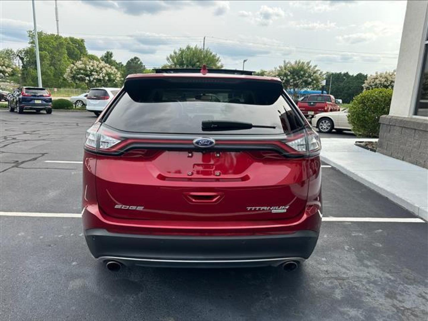 2017 Ruby Red Metallic Tinted Clearcoat Ford Edge Titanium (2FMPK3K96HB) , 6-Speed Automatic transmission, located at 3900 Bragg Blvd., Fayetteville, NC, 28303, (910) 868-3000, 35.081905, -78.943367 - T-9435-R1 - 2017 Ford Edge 2FMPK3K96HBB20476 - Photo#3