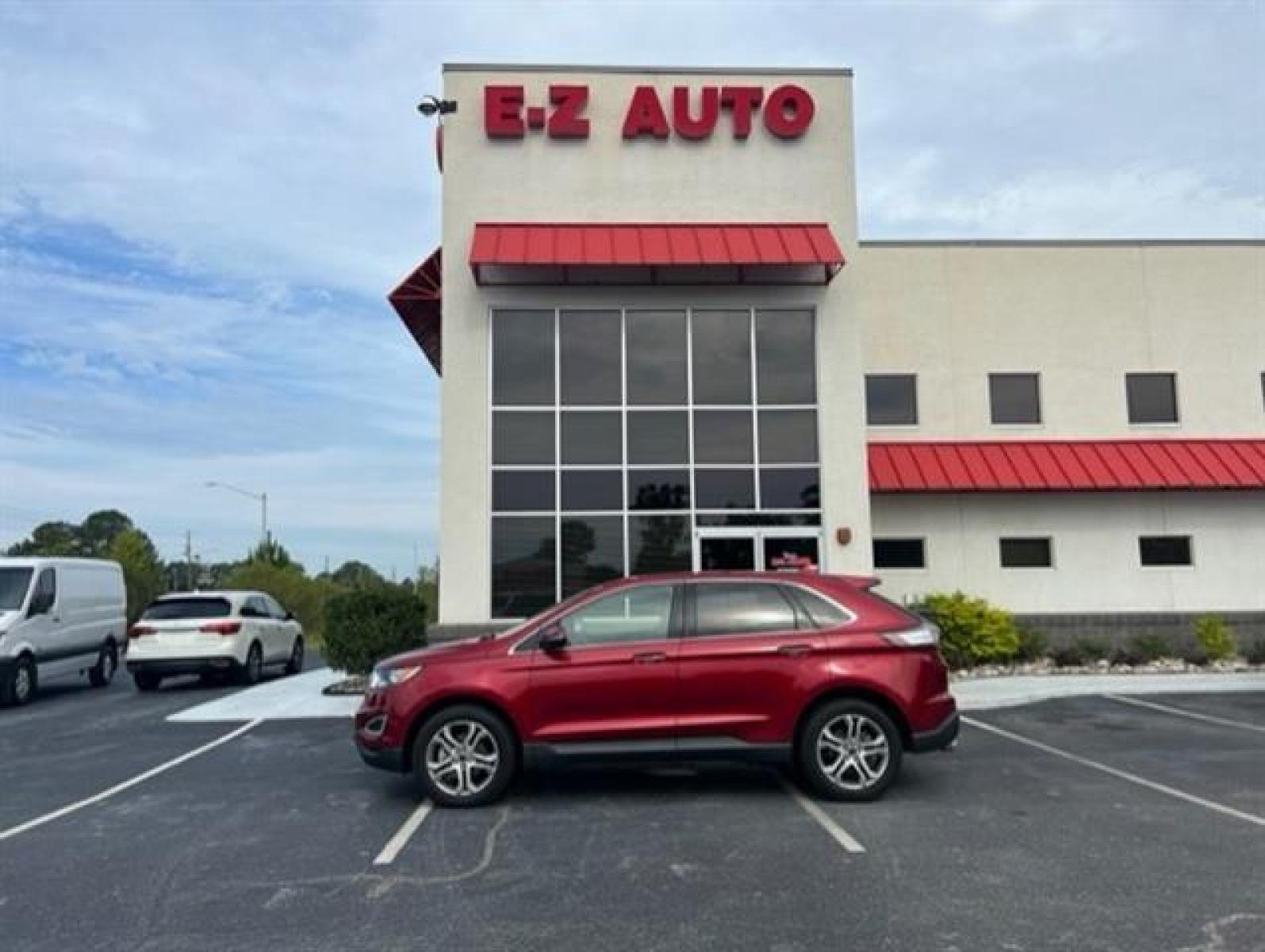 2017 Ruby Red Metallic Tinted Clearcoat Ford Edge Titanium (2FMPK3K96HB) , 6-Speed Automatic transmission, located at 3900 Bragg Blvd., Fayetteville, NC, 28303, (910) 868-3000, 35.081905, -78.943367 - T-9435 - 2017 Ford Edge 2FMPK3K96HBB20476 - Photo #0