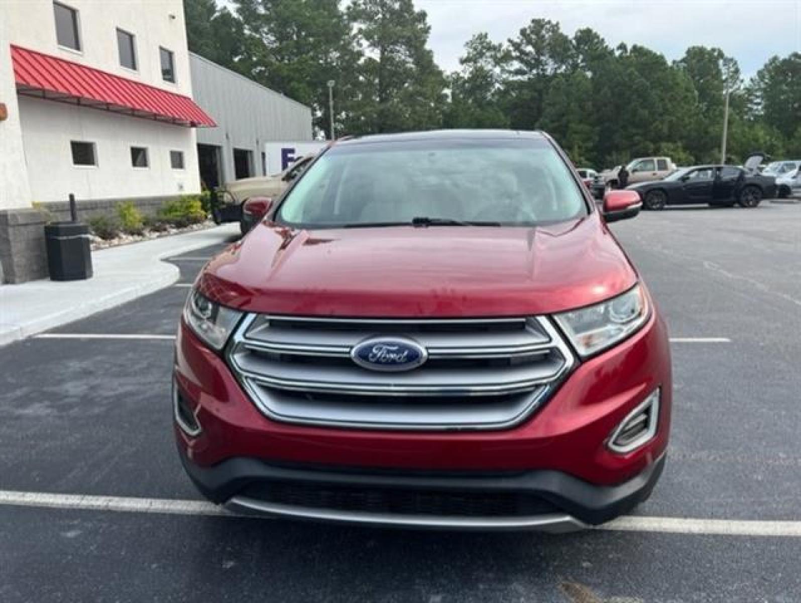 2017 Ruby Red Metallic Tinted Clearcoat Ford Edge Titanium (2FMPK3K96HB) , 6-Speed Automatic transmission, located at 3900 Bragg Blvd., Fayetteville, NC, 28303, (910) 868-3000, 35.081905, -78.943367 - T-9435 - 2017 Ford Edge 2FMPK3K96HBB20476 - Photo #3