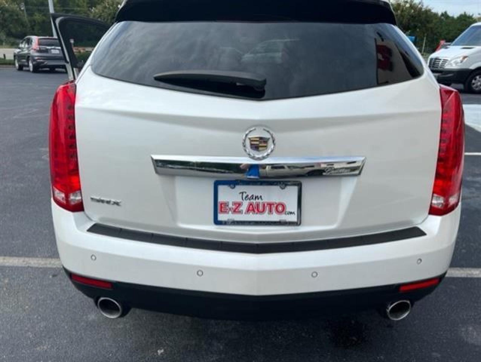 2011 Platinum Ice Tricoat Cadillac SRX Luxury Collection (3GYFNAEY3BS) , 6-Speed Automatic transmission, located at 3900 Bragg Blvd., Fayetteville, NC, 28303, (910) 868-3000, 35.081905, -78.943367 - T-9475 - 2011 Cadillac SRX 3GYFNAEY3BS539735 - Photo #6