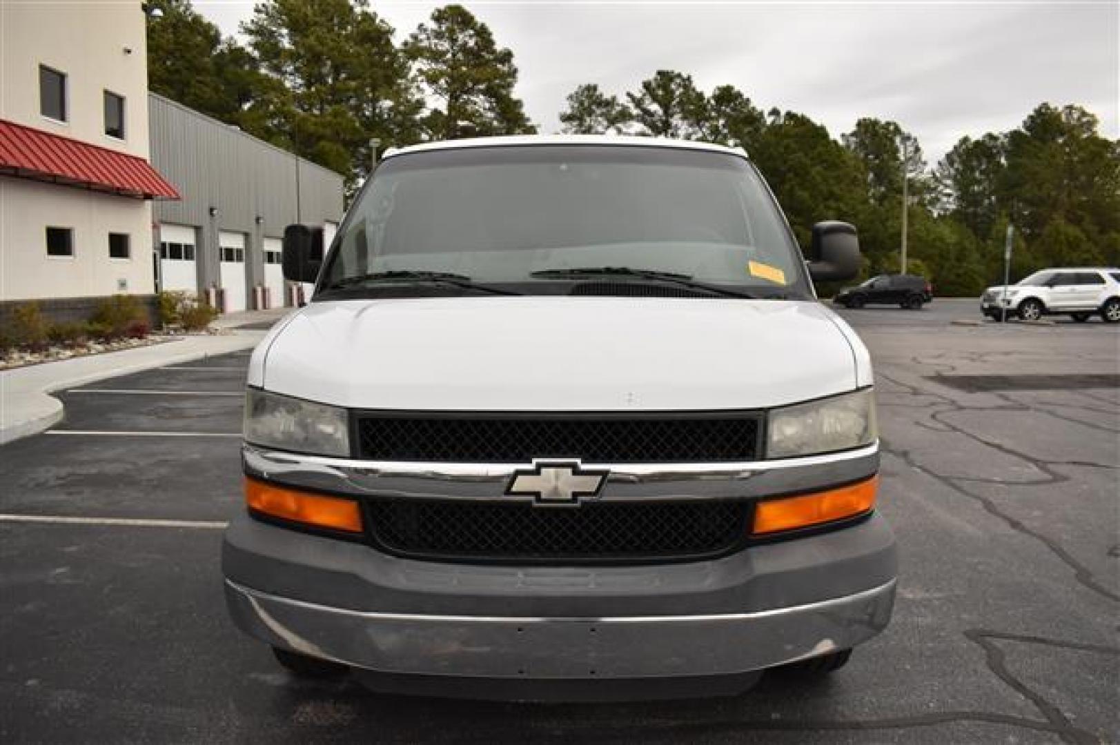 2009 White Chevrolet Express LS 3500 (1GAHG35K491) , 4-Speed Automatic transmission, located at 3900 Bragg Blvd., Fayetteville, NC, 28303, (910) 868-3000, 35.081905, -78.943367 - T-9476 - 2009 Chevrolet Express 1GAHG35K491150106 - Photo#1