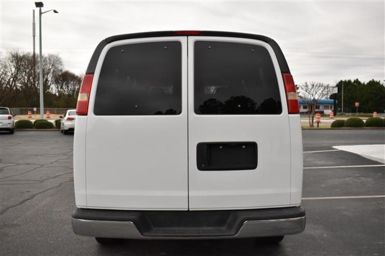 2009 White Chevrolet Express LS 3500 (1GAHG35K491) , 4-Speed Automatic transmission, located at 3900 Bragg Blvd., Fayetteville, NC, 28303, (910) 868-3000, 35.081905, -78.943367 - T-9476 - 2009 Chevrolet Express 1GAHG35K491150106 - Photo#2