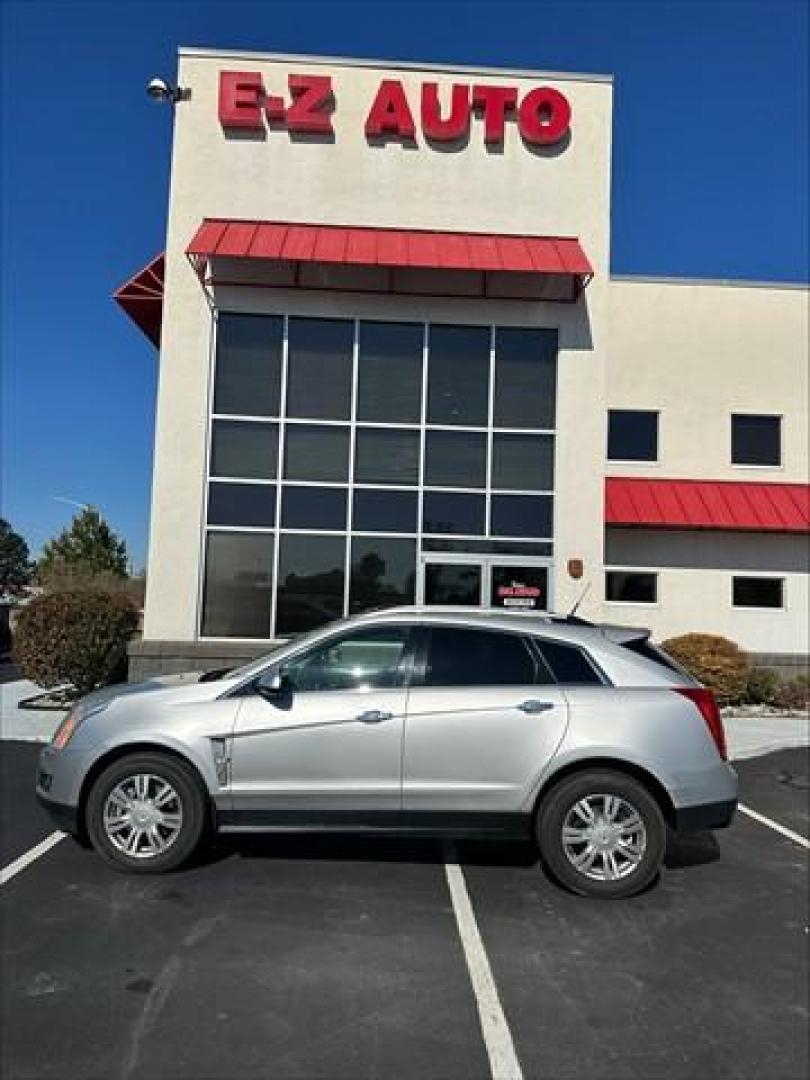2012 Silver Cadillac SRX Luxury (3GYFNAE34CS) , 6-Speed Automatic transmission, located at 3900 Bragg Blvd., Fayetteville, NC, 28303, (910) 868-3000, 35.081905, -78.943367 - Photo#0