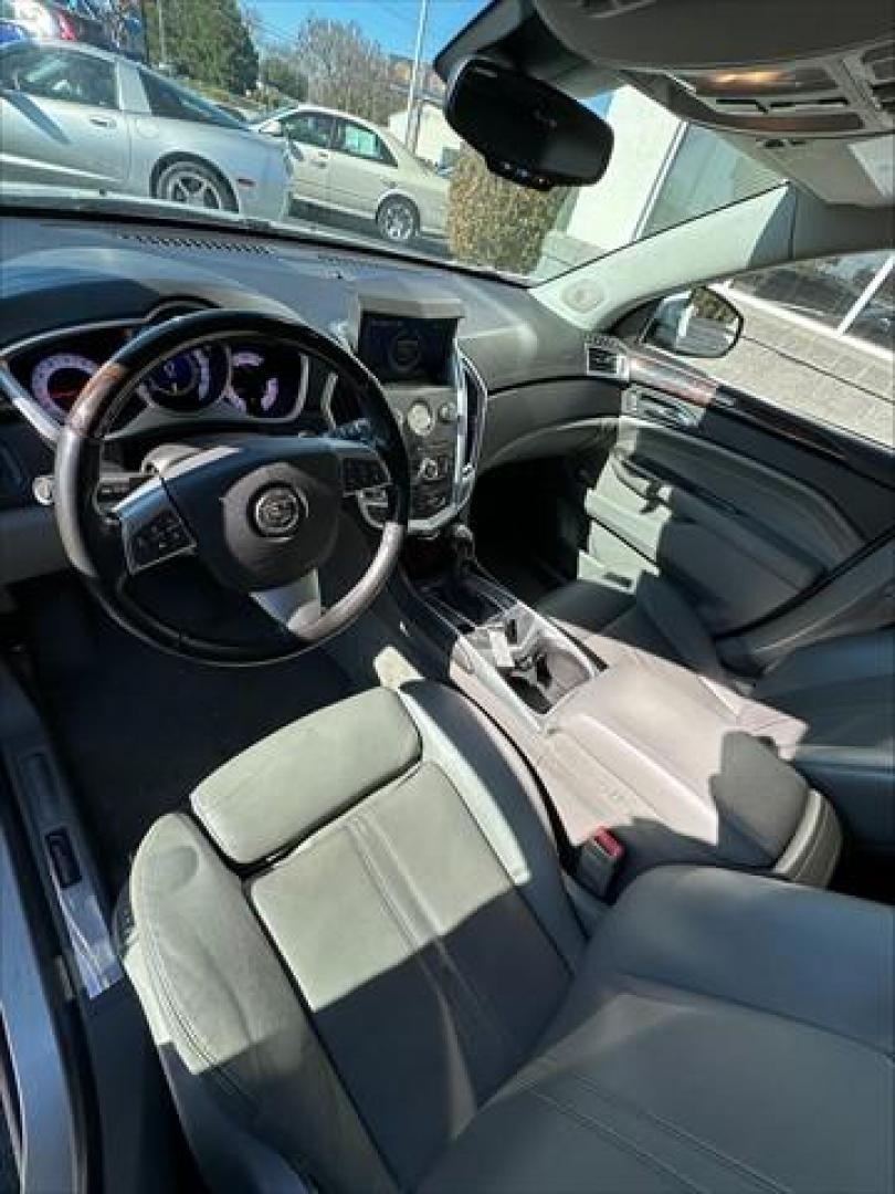 2012 Silver Cadillac SRX Luxury (3GYFNAE34CS) , 6-Speed Automatic transmission, located at 3900 Bragg Blvd., Fayetteville, NC, 28303, (910) 868-3000, 35.081905, -78.943367 - Photo#4