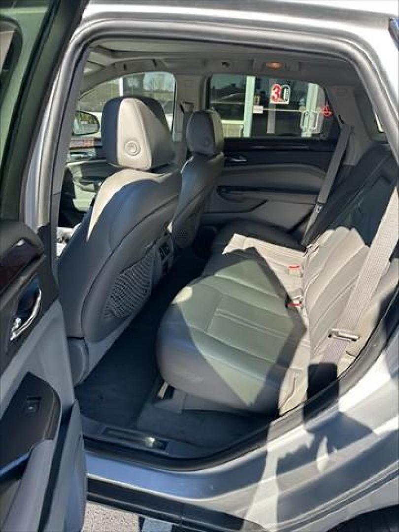 2012 Silver Cadillac SRX Luxury (3GYFNAE34CS) , 6-Speed Automatic transmission, located at 3900 Bragg Blvd., Fayetteville, NC, 28303, (910) 868-3000, 35.081905, -78.943367 - Photo#6