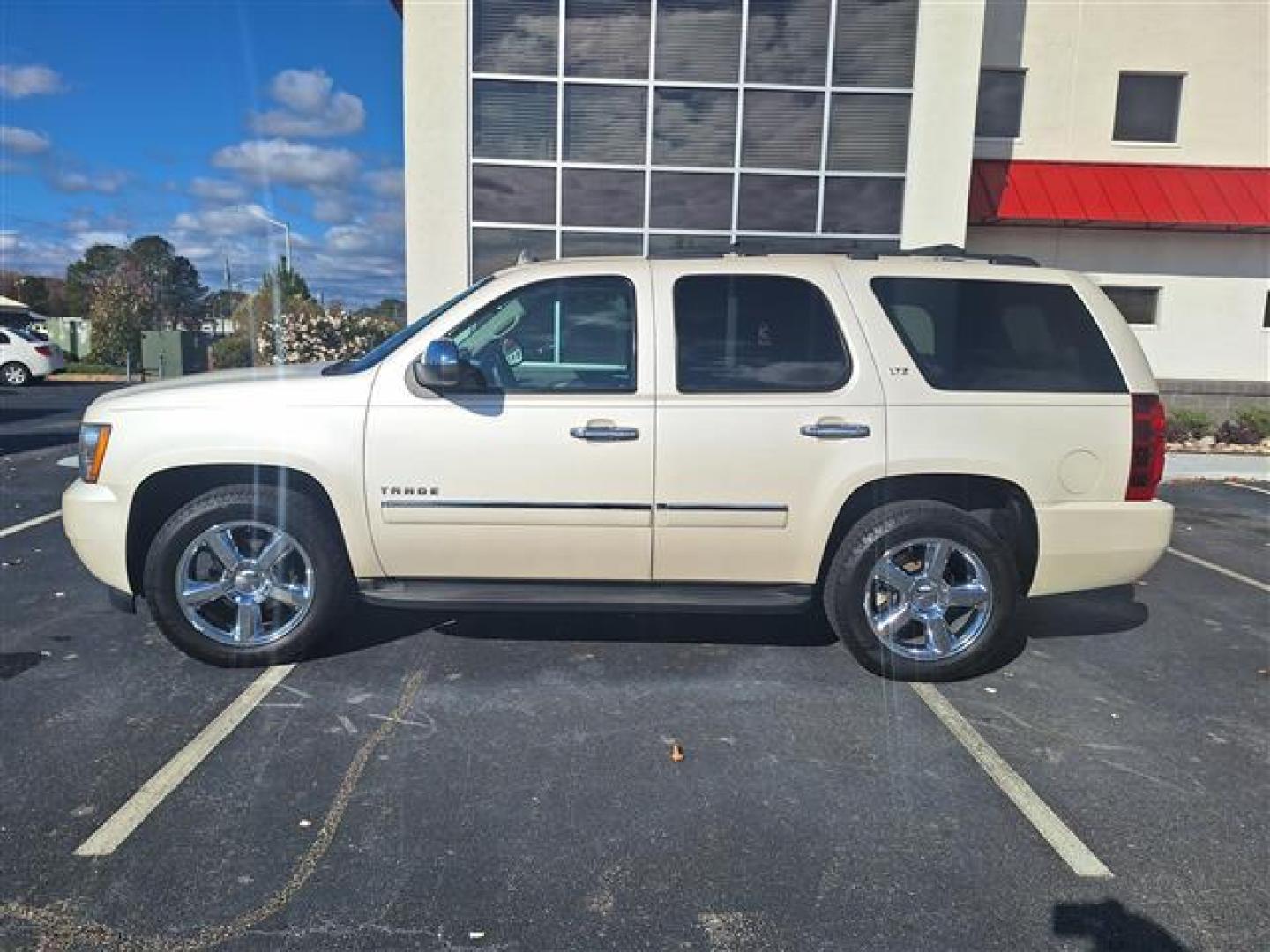 2013 White Diamond Chevrolet Tahoe LTZ 2WD (1GNSCCE08DR) , 6-Speed Automatic transmission, located at 3900 Bragg Blvd., Fayetteville, NC, 28303, (910) 868-3000, 35.081905, -78.943367 - T-9496 - 2013 Chevrolet Tahoe 1GNSCCE08DR370227 - Photo#0