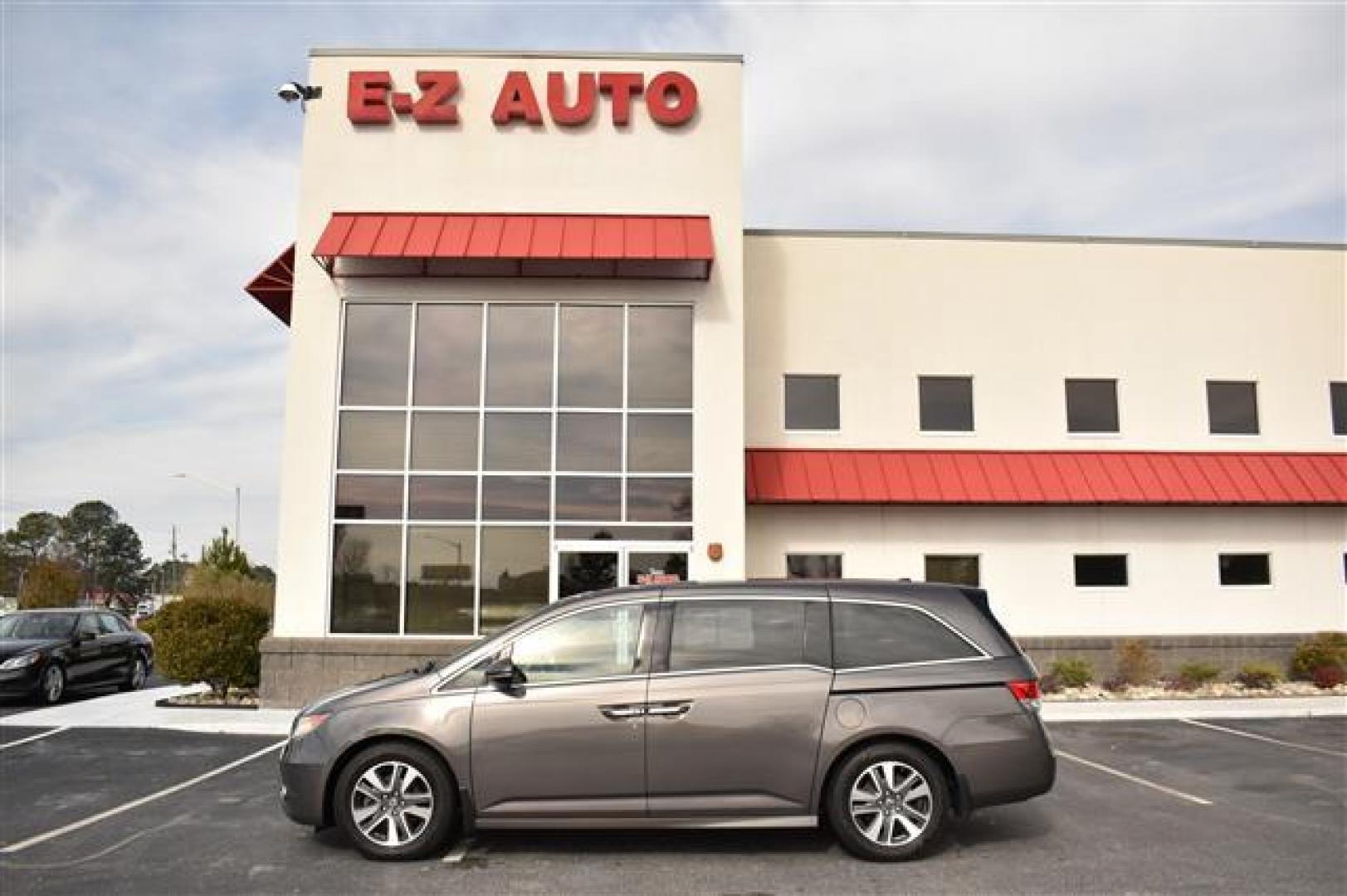 2014 Smoky Topaz Metallic /Brown Honda Odyssey Touring (5FNRL5H9XEB) , 6-Speed Automatic transmission, located at 3900 Bragg Blvd., Fayetteville, NC, 28303, (910) 868-3000, 35.081905, -78.943367 - T-9505 - 2014 Honda Odyssey 5FNRL5H9XEB070080 - Photo#0