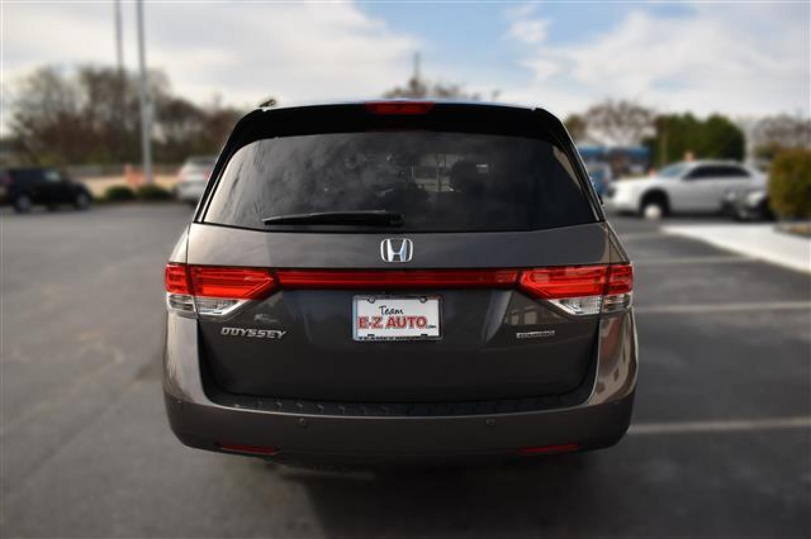 2014 Smoky Topaz Metallic /Brown Honda Odyssey Touring (5FNRL5H9XEB) , 6-Speed Automatic transmission, located at 3900 Bragg Blvd., Fayetteville, NC, 28303, (910) 868-3000, 35.081905, -78.943367 - T-9505 - 2014 Honda Odyssey 5FNRL5H9XEB070080 - Photo#3