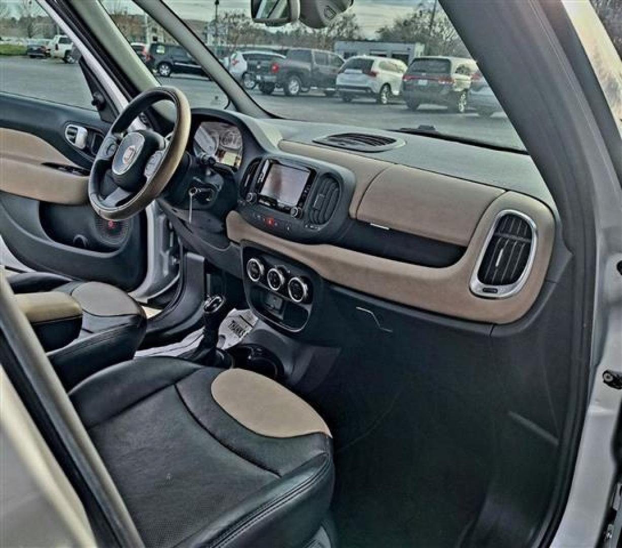 2015 Silver /Black Fiat 500L Lounge (ZFBCFACH3FZ) , 6-Speed Automatic transmission, located at 3900 Bragg Blvd., Fayetteville, NC, 28303, (910) 868-3000, 35.081905, -78.943367 - T-9508 - 2015 Fiat 500L ZFBCFACH3FZ031236 - Photo#9