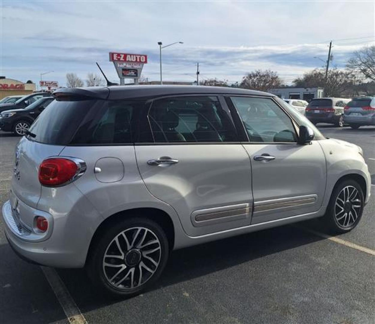 2015 Silver /Black Fiat 500L Lounge (ZFBCFACH3FZ) , 6-Speed Automatic transmission, located at 3900 Bragg Blvd., Fayetteville, NC, 28303, (910) 868-3000, 35.081905, -78.943367 - T-9508 - 2015 Fiat 500L ZFBCFACH3FZ031236 - Photo#2