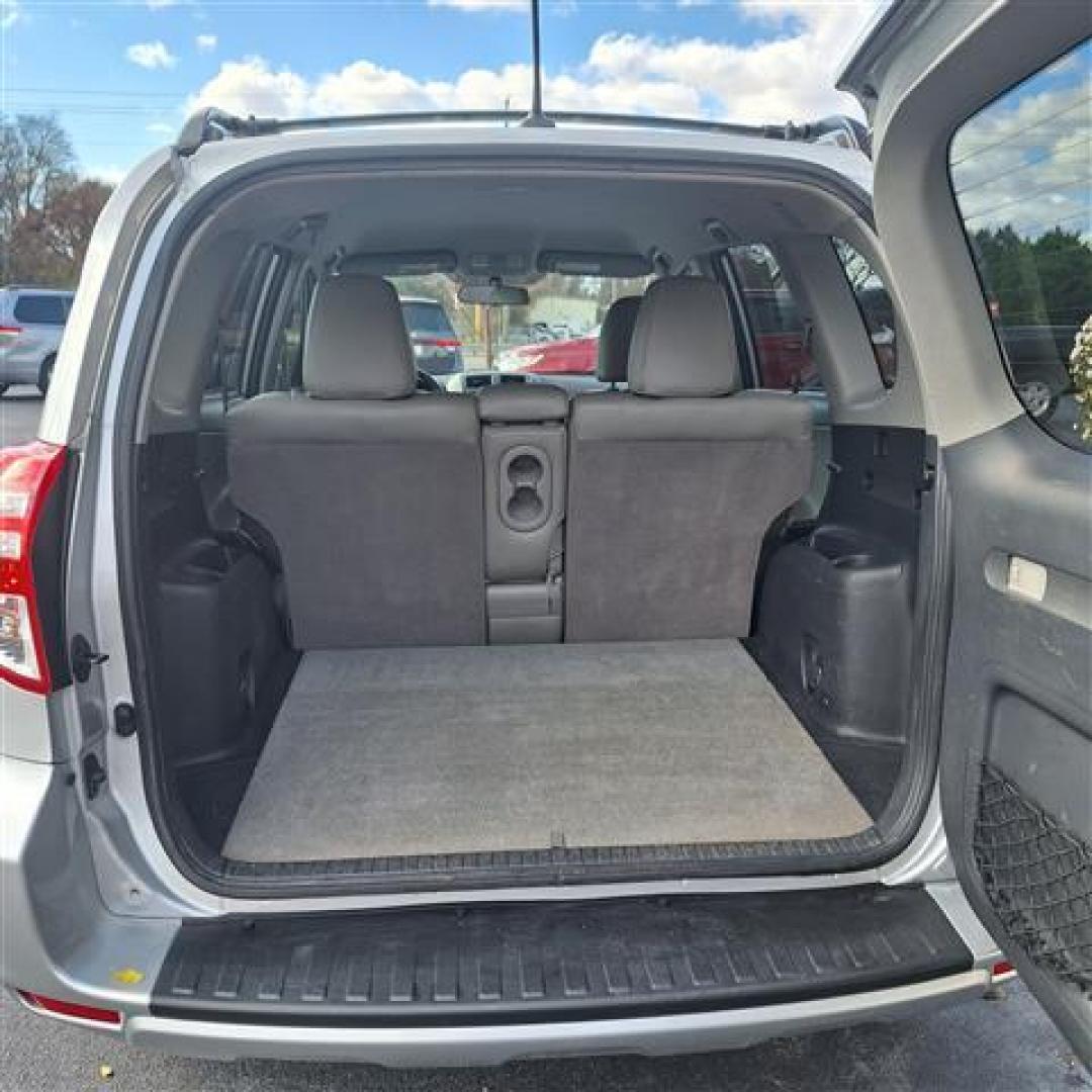 2012 Classic Silver Metallic Toyota RAV4 Base I4 4WD (2T3BF4DV2CW) , 4-Speed Automatic transmission, located at 3900 Bragg Blvd., Fayetteville, NC, 28303, (910) 868-3000, 35.081905, -78.943367 - T-9512 - 2012 Toyota RAV4 2T3BF4DV2CW239604 - Photo#4