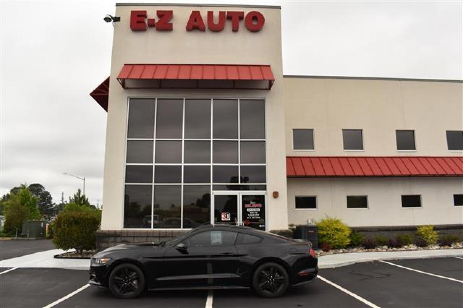 2015 Black Ford Mustang EcoBoost Premium Coupe (1FA6P8TH9F5) , 6-Speed Automatic transmission, located at 3900 Bragg Blvd., Fayetteville, NC, 28303, (910) 868-3000, 35.081905, -78.943367 - T-9527 - 2015 Ford Mustang 1FA6P8TH9F5418581 - Photo#0