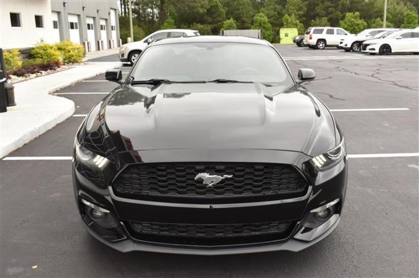 2015 Black Ford Mustang EcoBoost Premium Coupe (1FA6P8TH9F5) , 6-Speed Automatic transmission, located at 3900 Bragg Blvd., Fayetteville, NC, 28303, (910) 868-3000, 35.081905, -78.943367 - T-9527 - 2015 Ford Mustang 1FA6P8TH9F5418581 - Photo#2