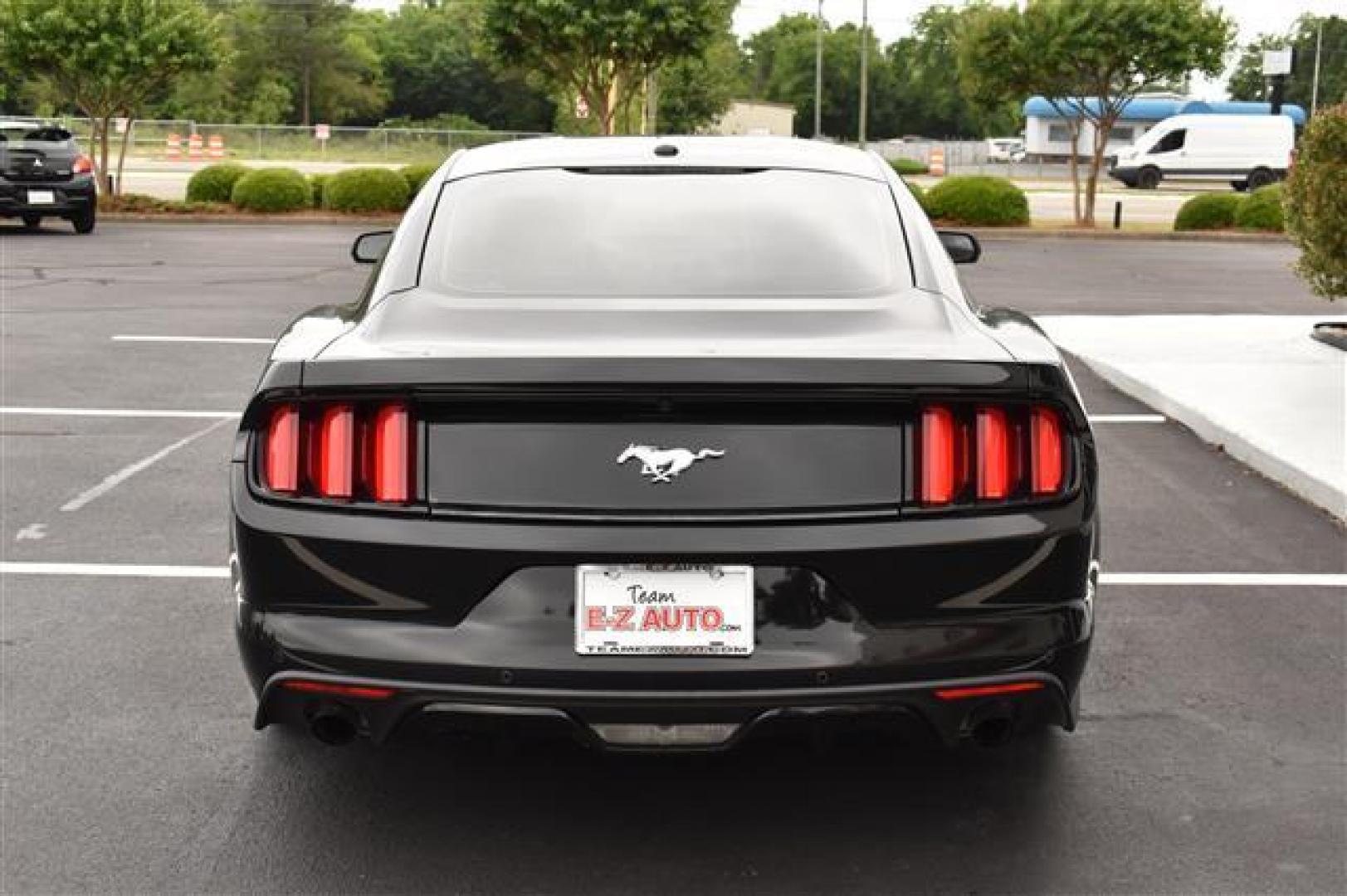 2015 Black Ford Mustang EcoBoost Premium Coupe (1FA6P8TH9F5) , 6-Speed Automatic transmission, located at 3900 Bragg Blvd., Fayetteville, NC, 28303, (910) 868-3000, 35.081905, -78.943367 - T-9527 - 2015 Ford Mustang 1FA6P8TH9F5418581 - Photo#3