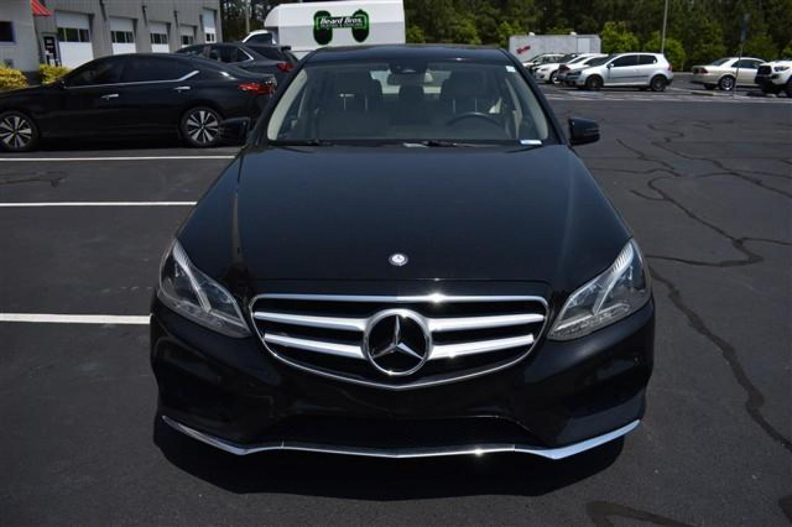 2014 Black Mercedes-Benz E-Class E350 Sedan (WDDHF5KB3EA) , 7-Speed Automatic transmission, located at 3900 Bragg Blvd., Fayetteville, NC, 28303, (910) 868-3000, 35.081905, -78.943367 - T-9554-R - 2014 Mercedes-Benz E-Class WDDHF5KB3EA939776 - Photo#2
