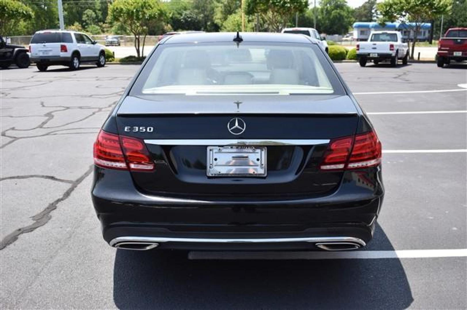 2014 Black Mercedes-Benz E-Class E350 Sedan (WDDHF5KB3EA) , 7-Speed Automatic transmission, located at 3900 Bragg Blvd., Fayetteville, NC, 28303, (910) 868-3000, 35.081905, -78.943367 - T-9554-R - 2014 Mercedes-Benz E-Class WDDHF5KB3EA939776 - Photo#3