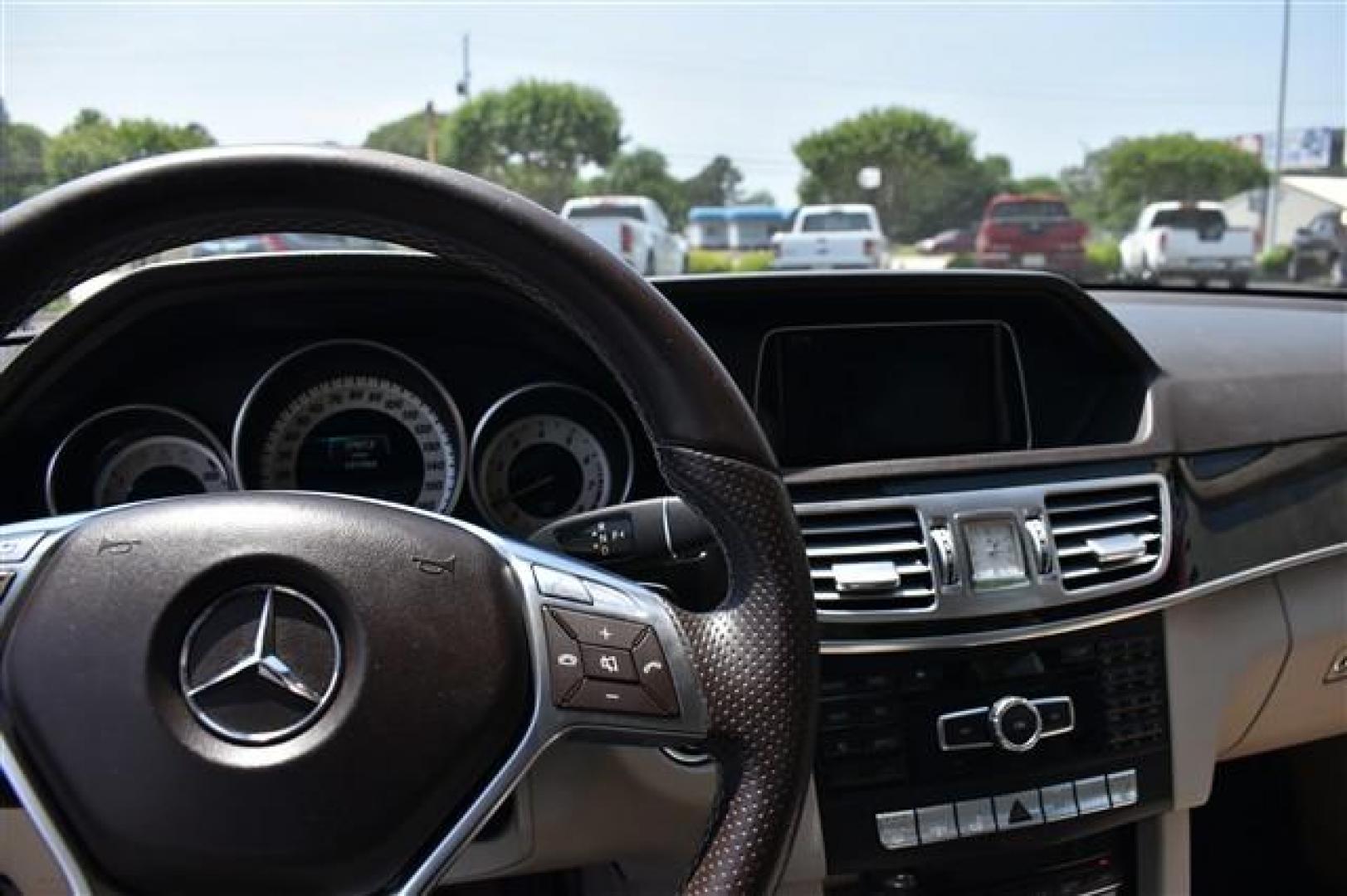 2014 Black Mercedes-Benz E-Class E350 Sedan (WDDHF5KB3EA) , 7-Speed Automatic transmission, located at 3900 Bragg Blvd., Fayetteville, NC, 28303, (910) 868-3000, 35.081905, -78.943367 - T-9554-R - 2014 Mercedes-Benz E-Class WDDHF5KB3EA939776 - Photo#8