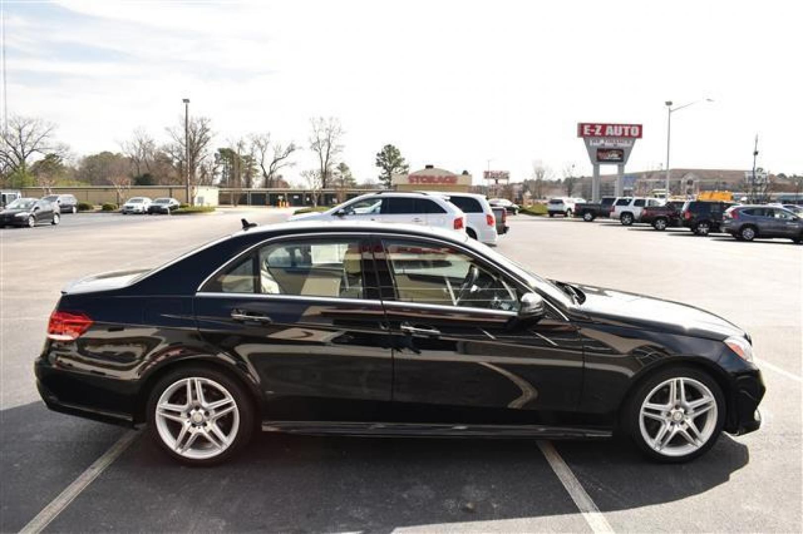 2014 Black Mercedes-Benz E-Class E350 Sedan (WDDHF5KB3EA) , 7-Speed Automatic transmission, located at 3900 Bragg Blvd., Fayetteville, NC, 28303, (910) 868-3000, 35.081905, -78.943367 - Photo#1