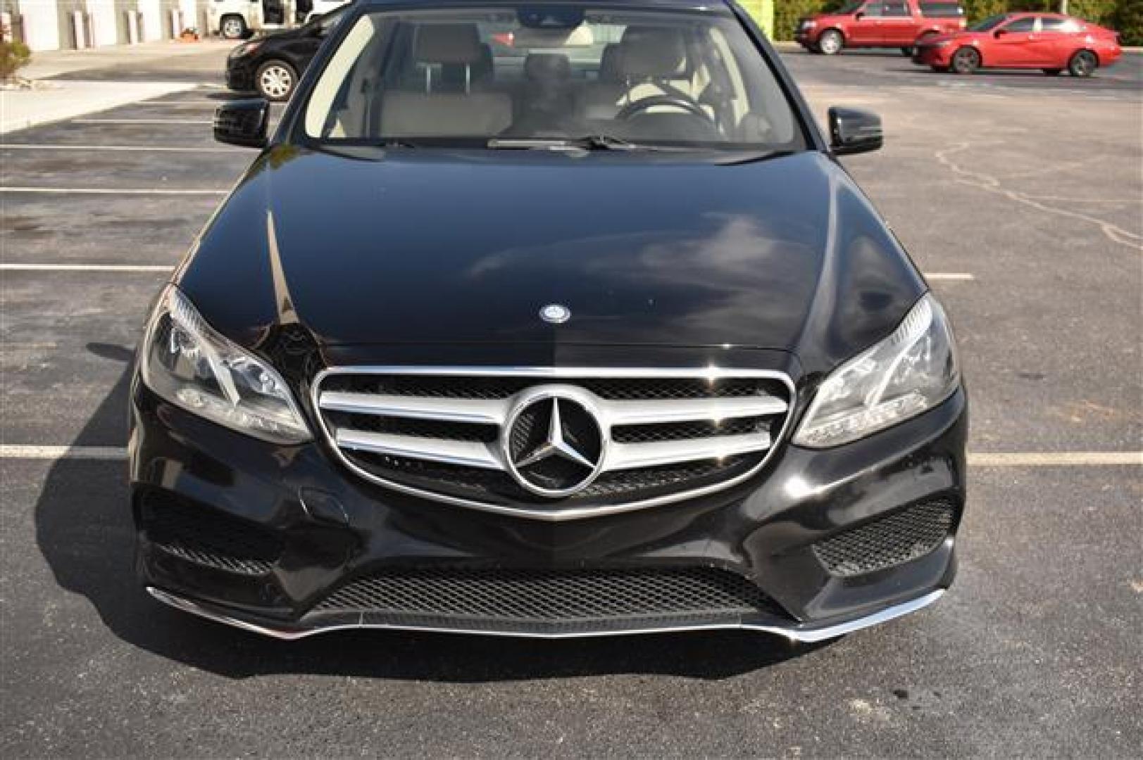 2014 Black Mercedes-Benz E-Class E350 Sedan (WDDHF5KB3EA) , 7-Speed Automatic transmission, located at 3900 Bragg Blvd., Fayetteville, NC, 28303, (910) 868-3000, 35.081905, -78.943367 - T-9554 - 2014 Mercedes-Benz E-Class WDDHF5KB3EA939776 - Photo#2