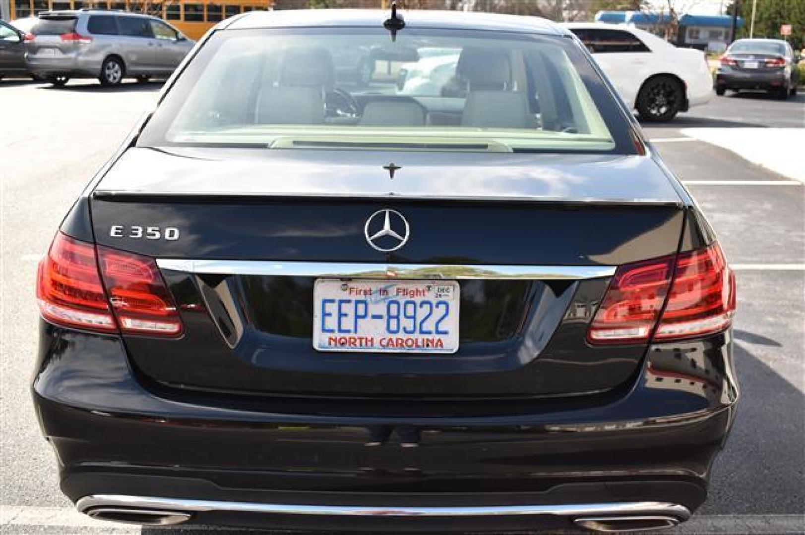 2014 Black Mercedes-Benz E-Class E350 Sedan (WDDHF5KB3EA) , 7-Speed Automatic transmission, located at 3900 Bragg Blvd., Fayetteville, NC, 28303, (910) 868-3000, 35.081905, -78.943367 - Photo#3