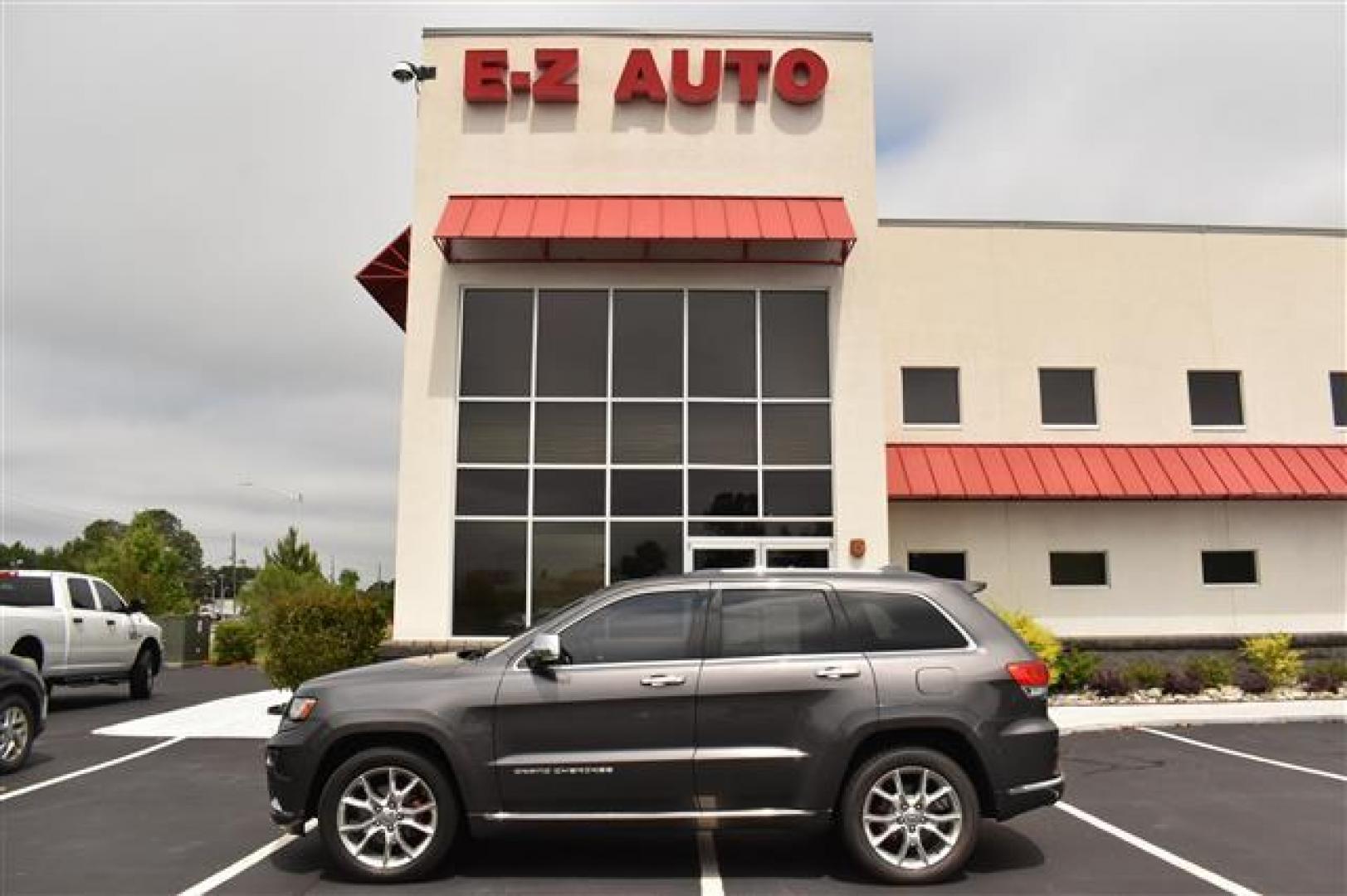 2014 Black Jeep Grand Cherokee Summit 4WD (1C4RJFJG0EC) , 5-Speed Automatic transmission, located at 3900 Bragg Blvd., Fayetteville, NC, 28303, (910) 868-3000, 35.081905, -78.943367 - T-9583 - 2014 Jeep Grand Cherokee 1C4RJFJG0EC214205 - Photo#0