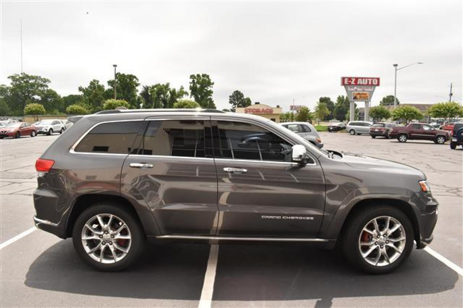 2014 Black Jeep Grand Cherokee Summit 4WD (1C4RJFJG0EC) , 5-Speed Automatic transmission, located at 3900 Bragg Blvd., Fayetteville, NC, 28303, (910) 868-3000, 35.081905, -78.943367 - T-9583 - 2014 Jeep Grand Cherokee 1C4RJFJG0EC214205 - Photo#1