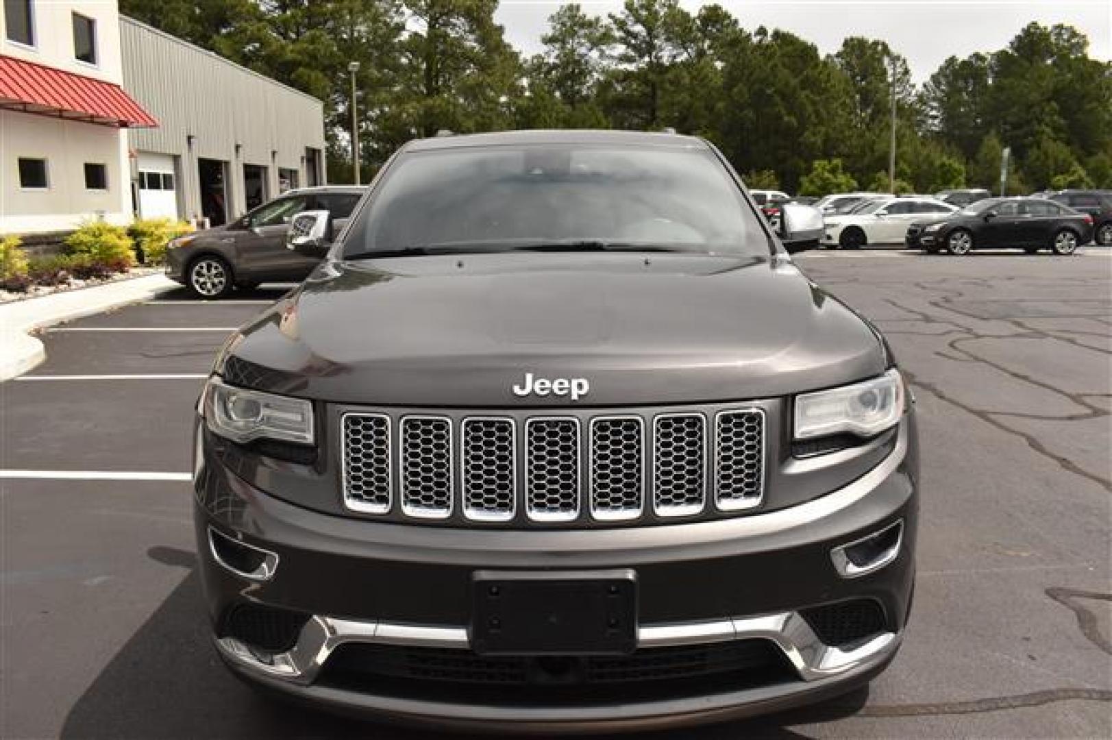 2014 Black Jeep Grand Cherokee Summit 4WD (1C4RJFJG0EC) , 5-Speed Automatic transmission, located at 3900 Bragg Blvd., Fayetteville, NC, 28303, (910) 868-3000, 35.081905, -78.943367 - T-9583 - 2014 Jeep Grand Cherokee 1C4RJFJG0EC214205 - Photo#2