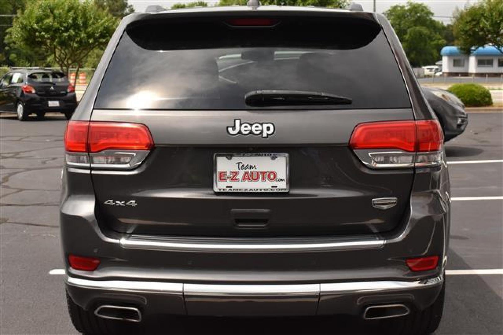 2014 Black Jeep Grand Cherokee Summit 4WD (1C4RJFJG0EC) , 5-Speed Automatic transmission, located at 3900 Bragg Blvd., Fayetteville, NC, 28303, (910) 868-3000, 35.081905, -78.943367 - T-9583 - 2014 Jeep Grand Cherokee 1C4RJFJG0EC214205 - Photo#3