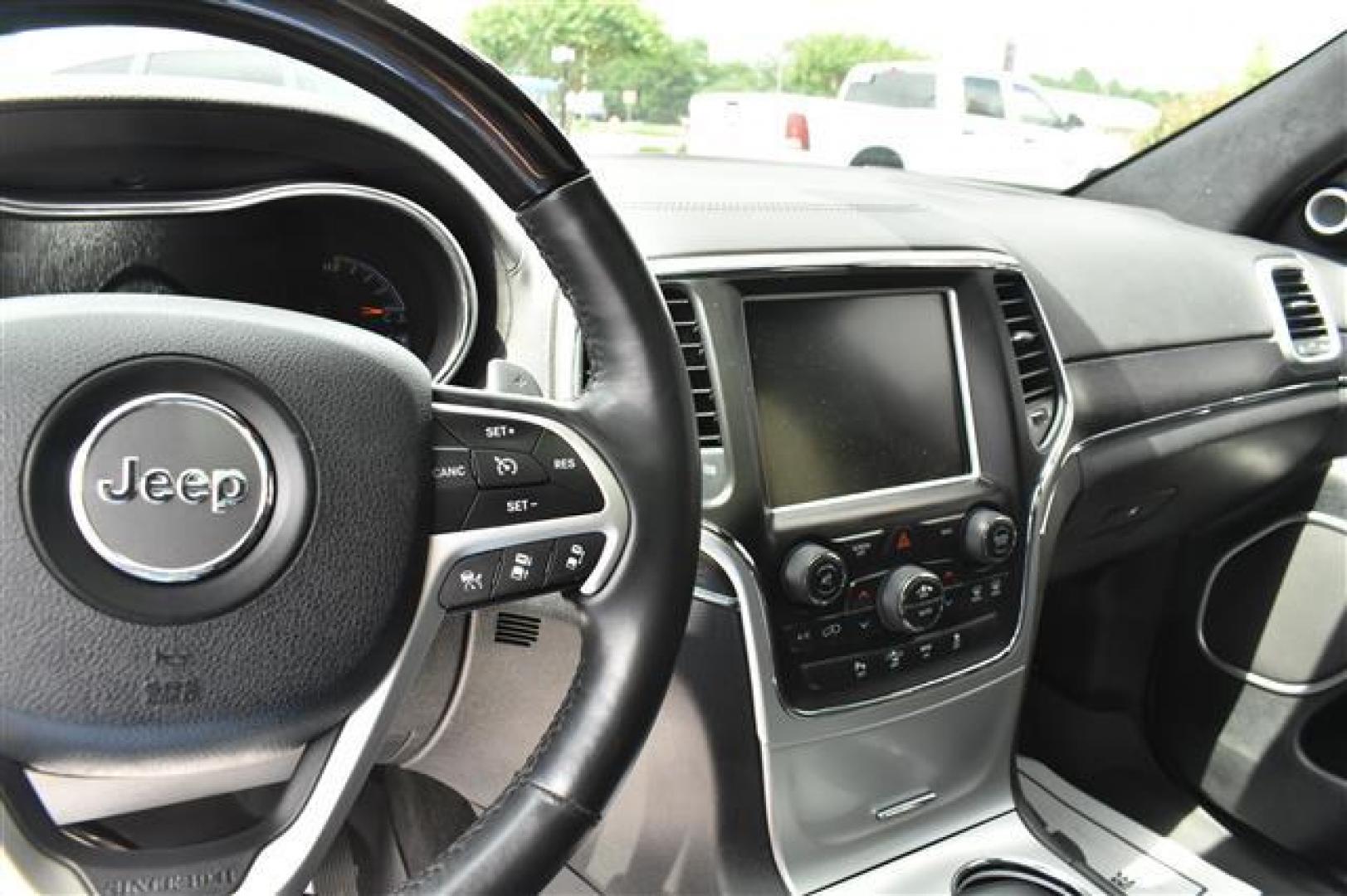 2014 Black Jeep Grand Cherokee Summit 4WD (1C4RJFJG0EC) , 5-Speed Automatic transmission, located at 3900 Bragg Blvd., Fayetteville, NC, 28303, (910) 868-3000, 35.081905, -78.943367 - T-9583 - 2014 Jeep Grand Cherokee 1C4RJFJG0EC214205 - Photo#7