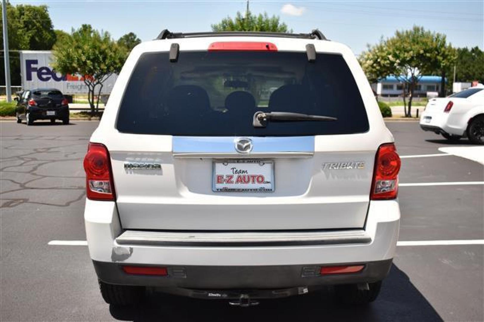 2009 White Suede Mazda Tribute i Touring FWD (4F2CZ02709K) , 4-Speed Automatic transmission, located at 3900 Bragg Blvd., Fayetteville, NC, 28303, (910) 868-3000, 35.081905, -78.943367 - T-9594 - 2009 Mazda Tribute 4F2CZ02709KM00140 - Photo#3