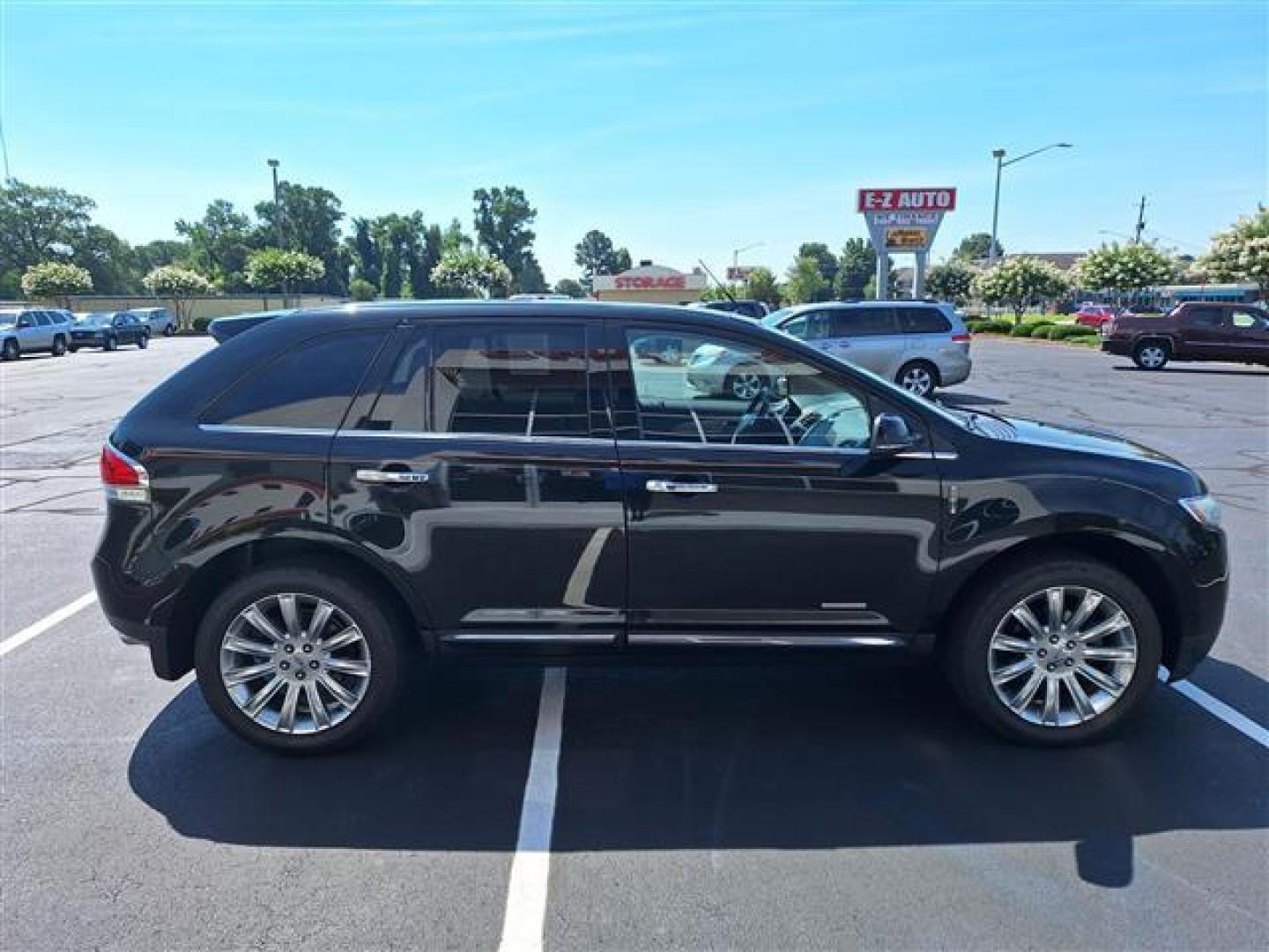 2014 Black /Tan Lincoln MKX AWD (2LMDJ8JK6EB) , 6-Speed Automatic transmission, located at 3900 Bragg Blvd., Fayetteville, NC, 28303, (910) 868-3000, 35.081905, -78.943367 - T-9607 - 2014 Lincoln MKX 2LMDJ8JK6EBL03576 - Photo#1