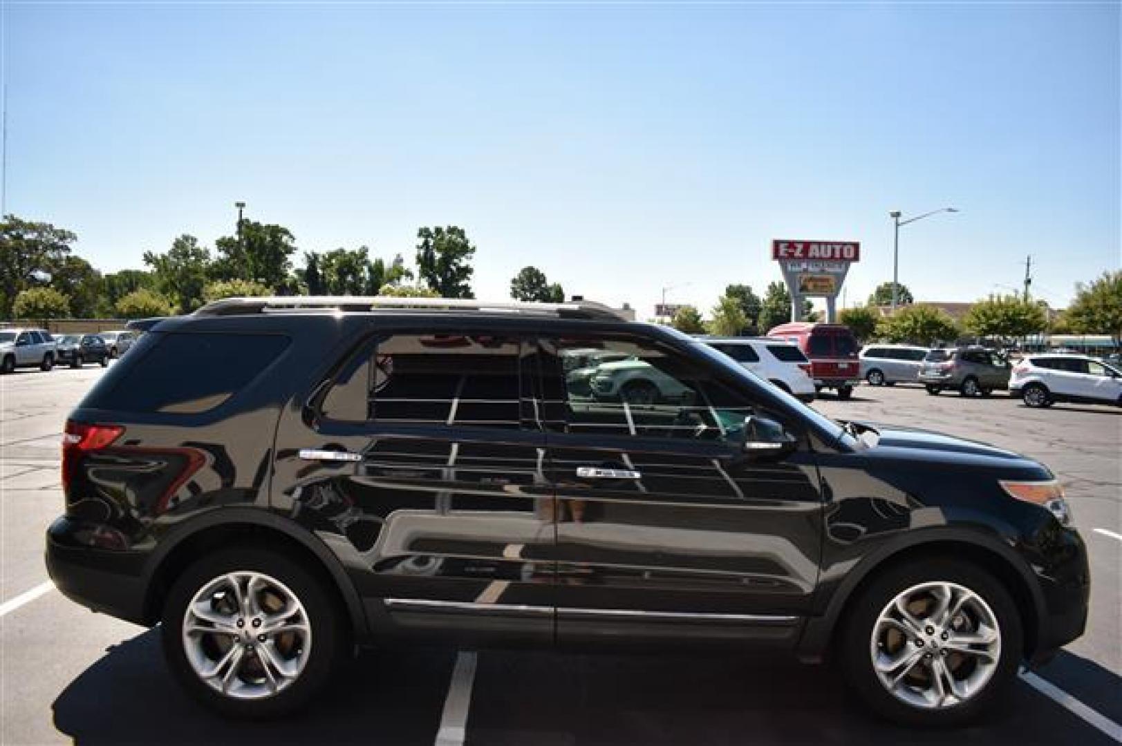 2014 Tuxedo Black Metallic Ford Explorer Limited 4WD (1FM5K8F86EG) , 6-Speed Automatic transmission, located at 3900 Bragg Blvd., Fayetteville, NC, 28303, (910) 868-3000, 35.081905, -78.943367 - T-9614 - 2014 Ford Explorer 1FM5K8F86EGC59789 - Photo#1