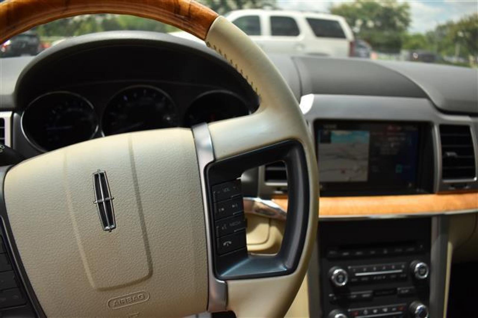 2012 White Platinum Metallic Tri Coat Lincoln MKZ FWD (3LNHL2GC9CR) , 6-Speed Automatic transmission, located at 3900 Bragg Blvd., Fayetteville, NC, 28303, (910) 868-3000, 35.081905, -78.943367 - T-9623 - 2012 Lincoln MKZ 3LNHL2GC9CR824116 - Photo#7