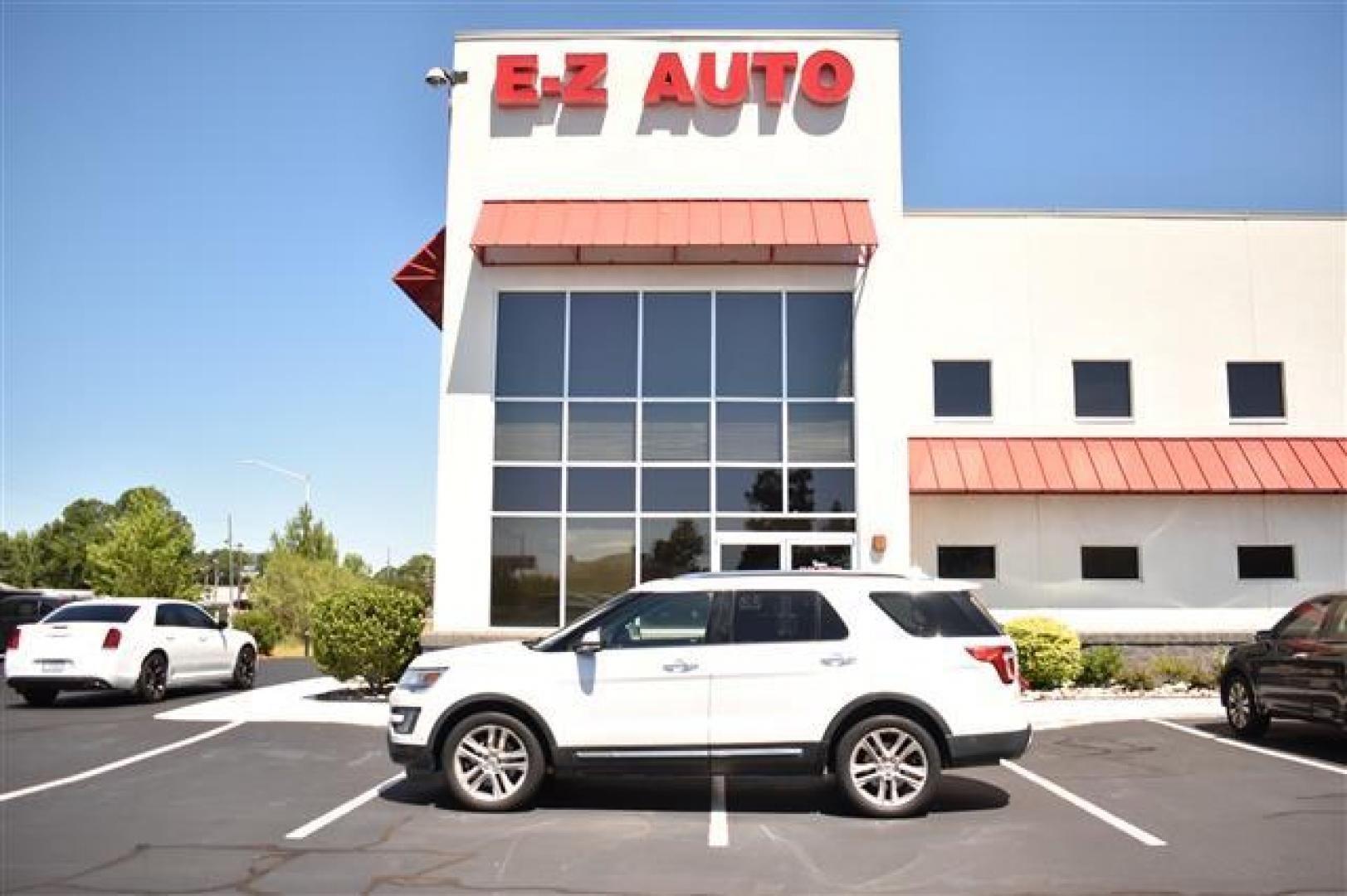 2016 White /Tan Ford Explorer Limited 4WD (1FM5K8F8XGG) , 6-Speed Automatic transmission, located at 3900 Bragg Blvd., Fayetteville, NC, 28303, (910) 868-3000, 35.081905, -78.943367 - T-9642 - 2016 Ford Explorer 1FM5K8F8XGGB59715 - Photo#0