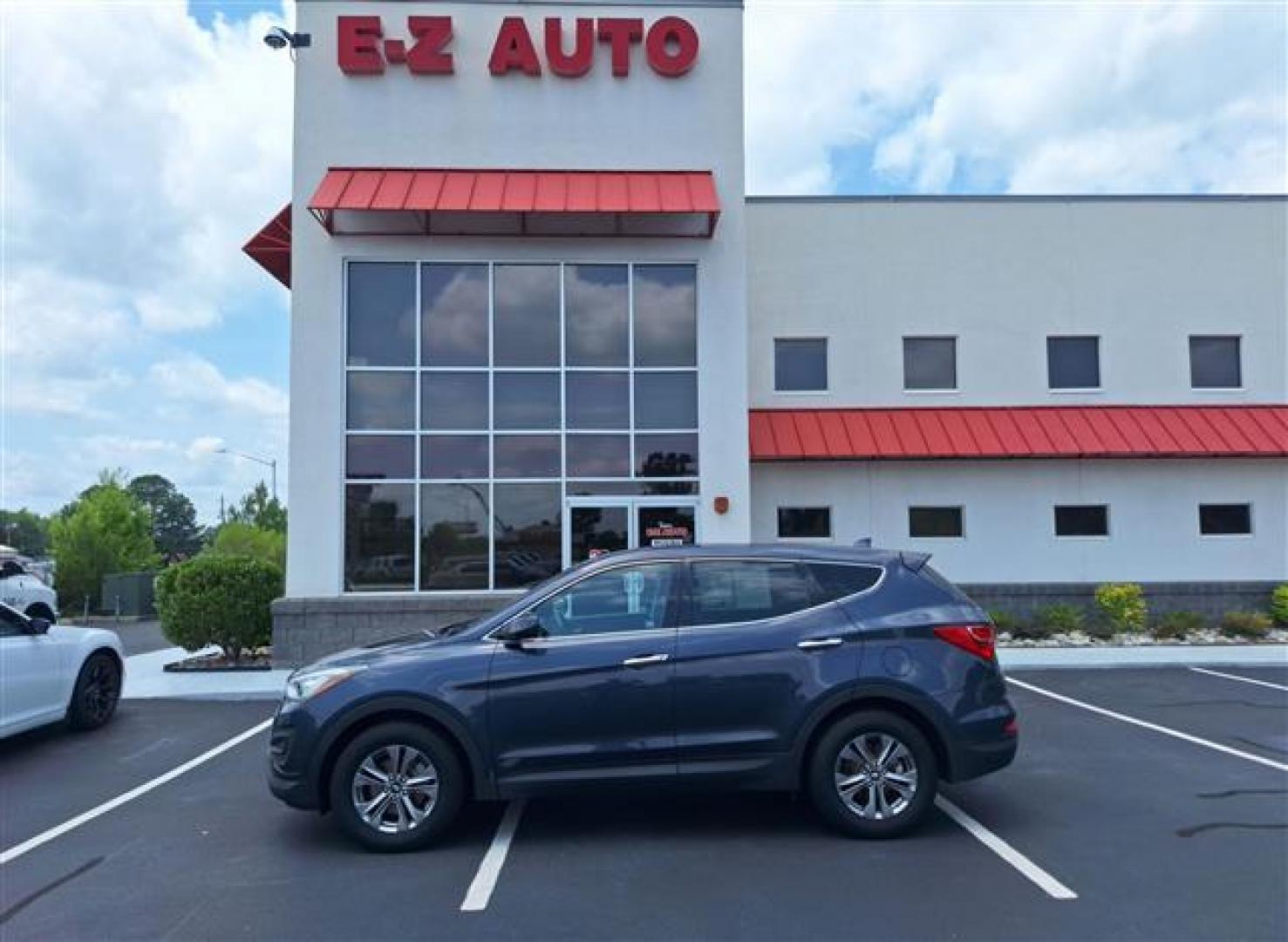 2016 Blue Hyundai Santa Fe Sport 2.4 AWD (5XYZTDLB9GG) , 6-Speed Automatic transmission, located at 3900 Bragg Blvd., Fayetteville, NC, 28303, (910) 868-3000, 35.081905, -78.943367 - Photo#0