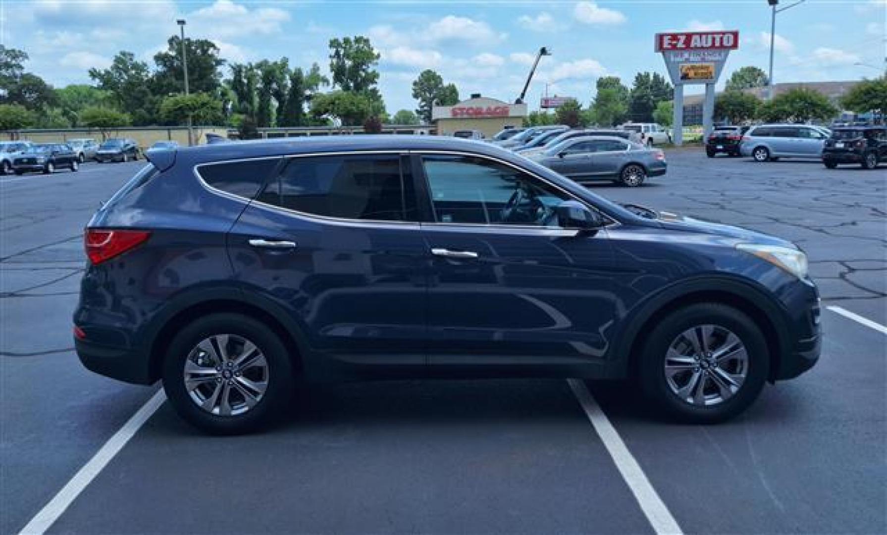 2016 Blue Hyundai Santa Fe Sport 2.4 AWD (5XYZTDLB9GG) , 6-Speed Automatic transmission, located at 3900 Bragg Blvd., Fayetteville, NC, 28303, (910) 868-3000, 35.081905, -78.943367 - Photo#1